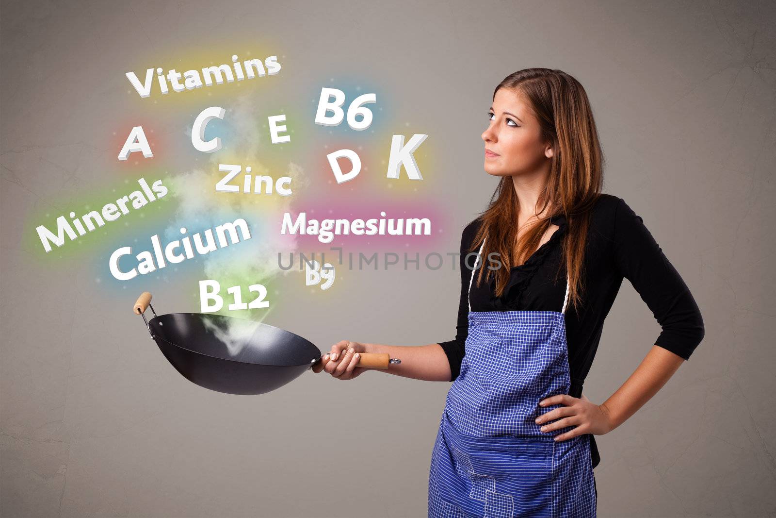 Pretty young woman cooking vitamins and minerals