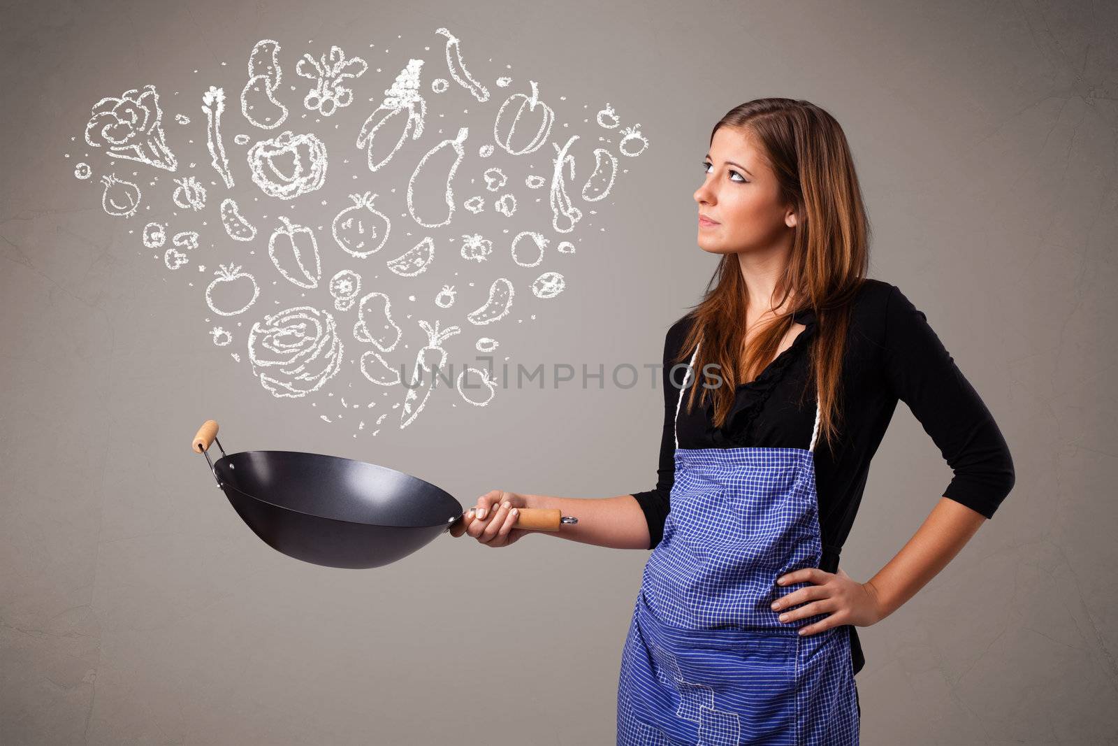 Pretty lady cooking vegetables