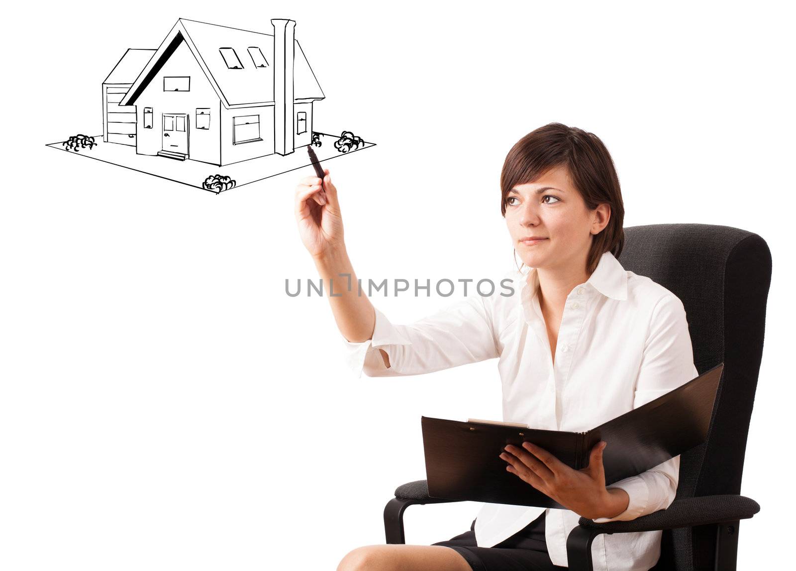 Young woman drawing a house on whiteboard isolated on white