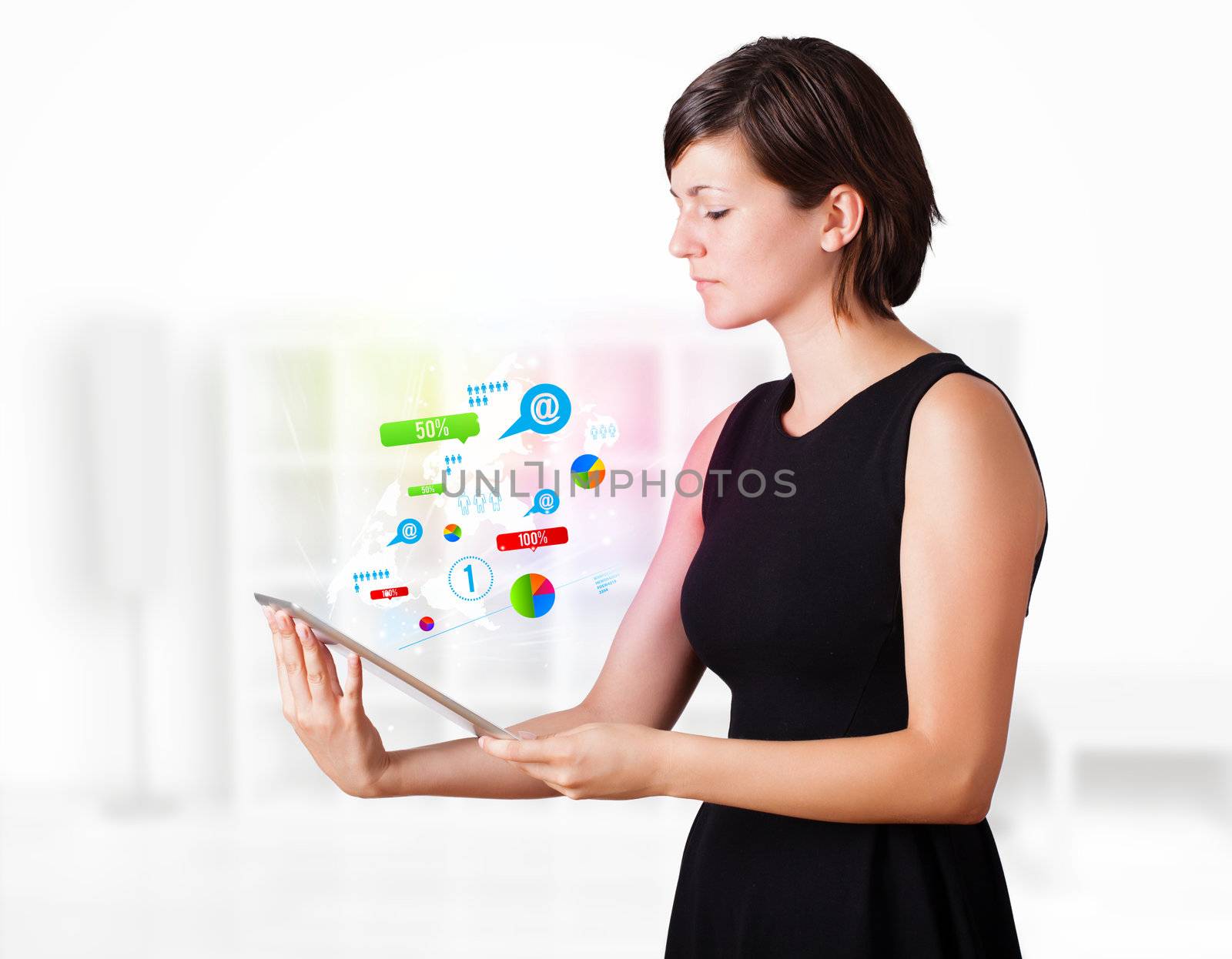 Young woman looking at modern tablet with colourful technology i by ra2studio