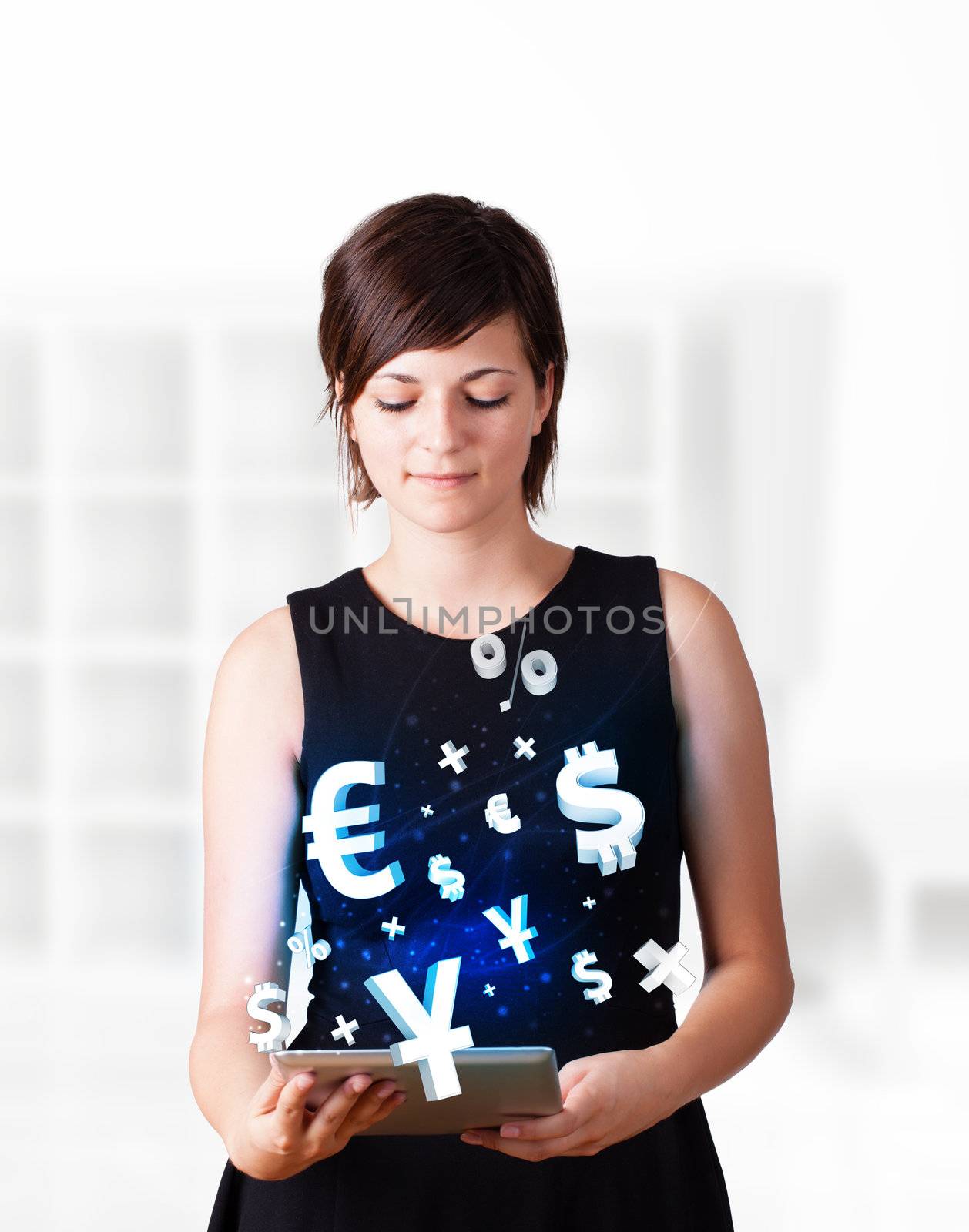 Young business woman looking at modern tablet with currency icons