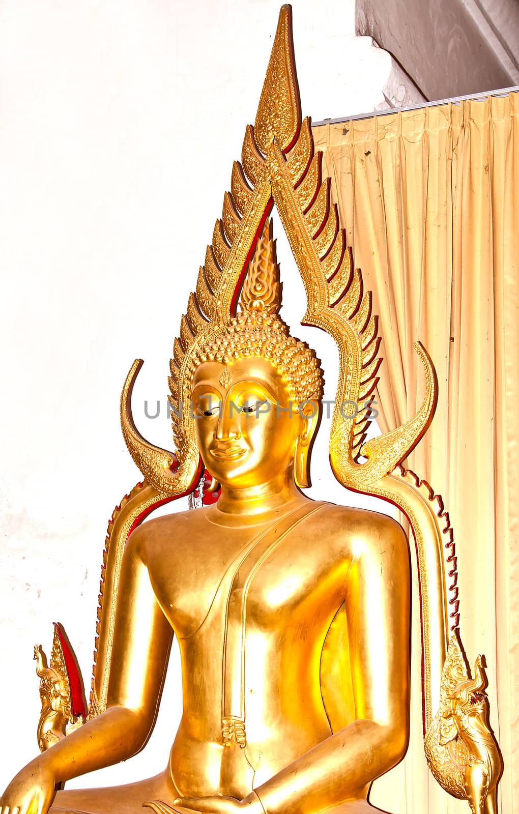 Buddha statue in the hallway  in the thai temple.