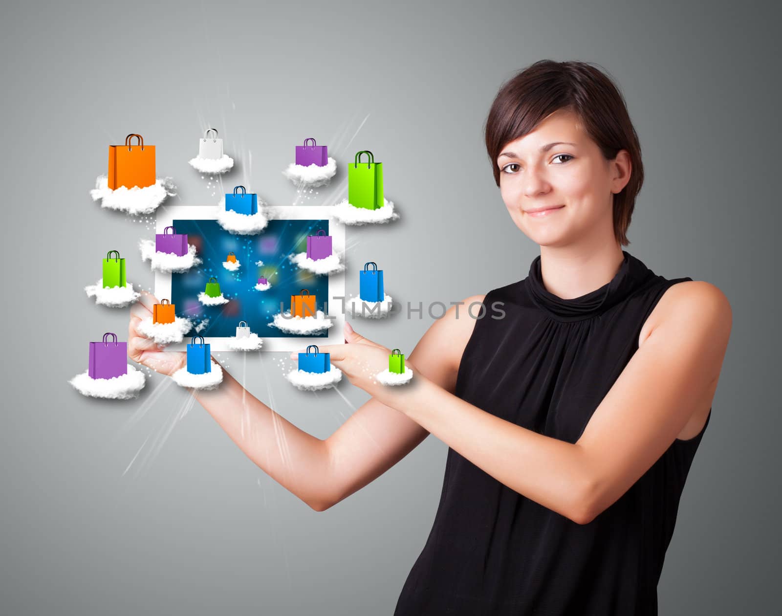 woman holding modern tablet with colorful shopping bags on cloud by ra2studio