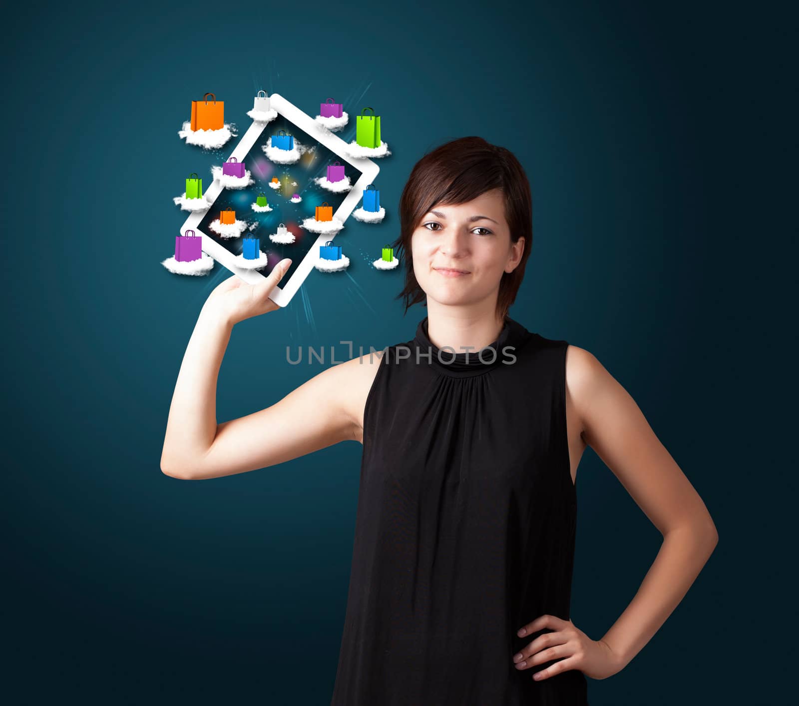 woman holding modern tablet with colorful shopping bags on cloud by ra2studio