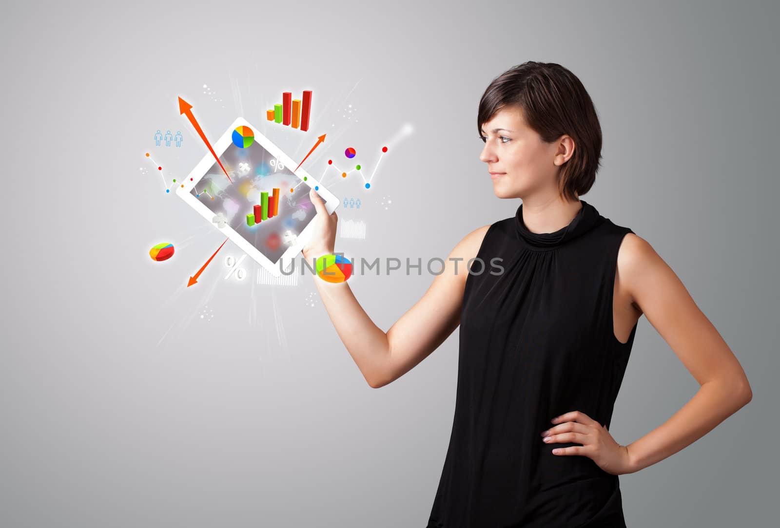 beutiful woman holding modern tablet with colorful diagrams and graphs