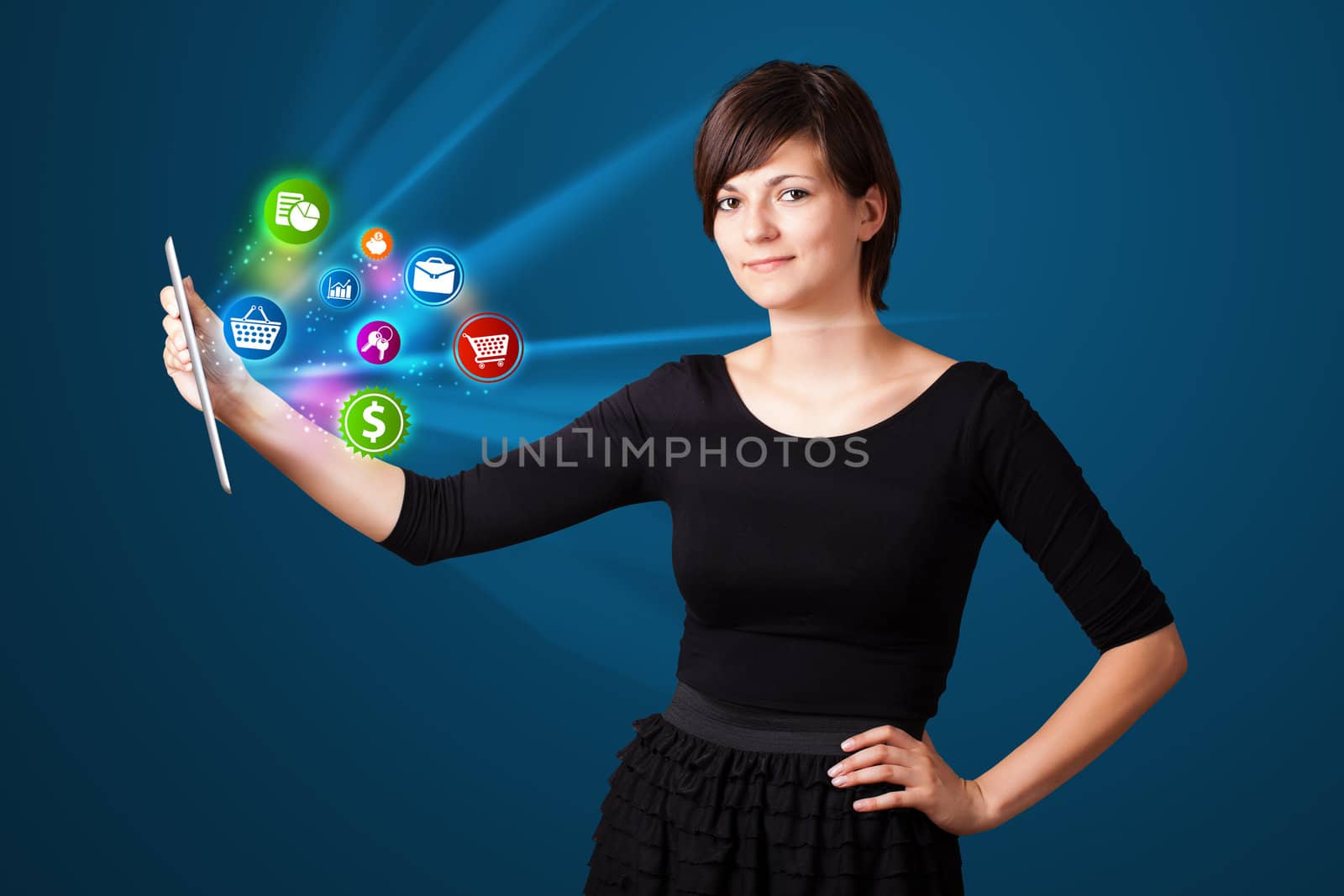 Young business woman looking at modern tablet with abstract lights and various icons
