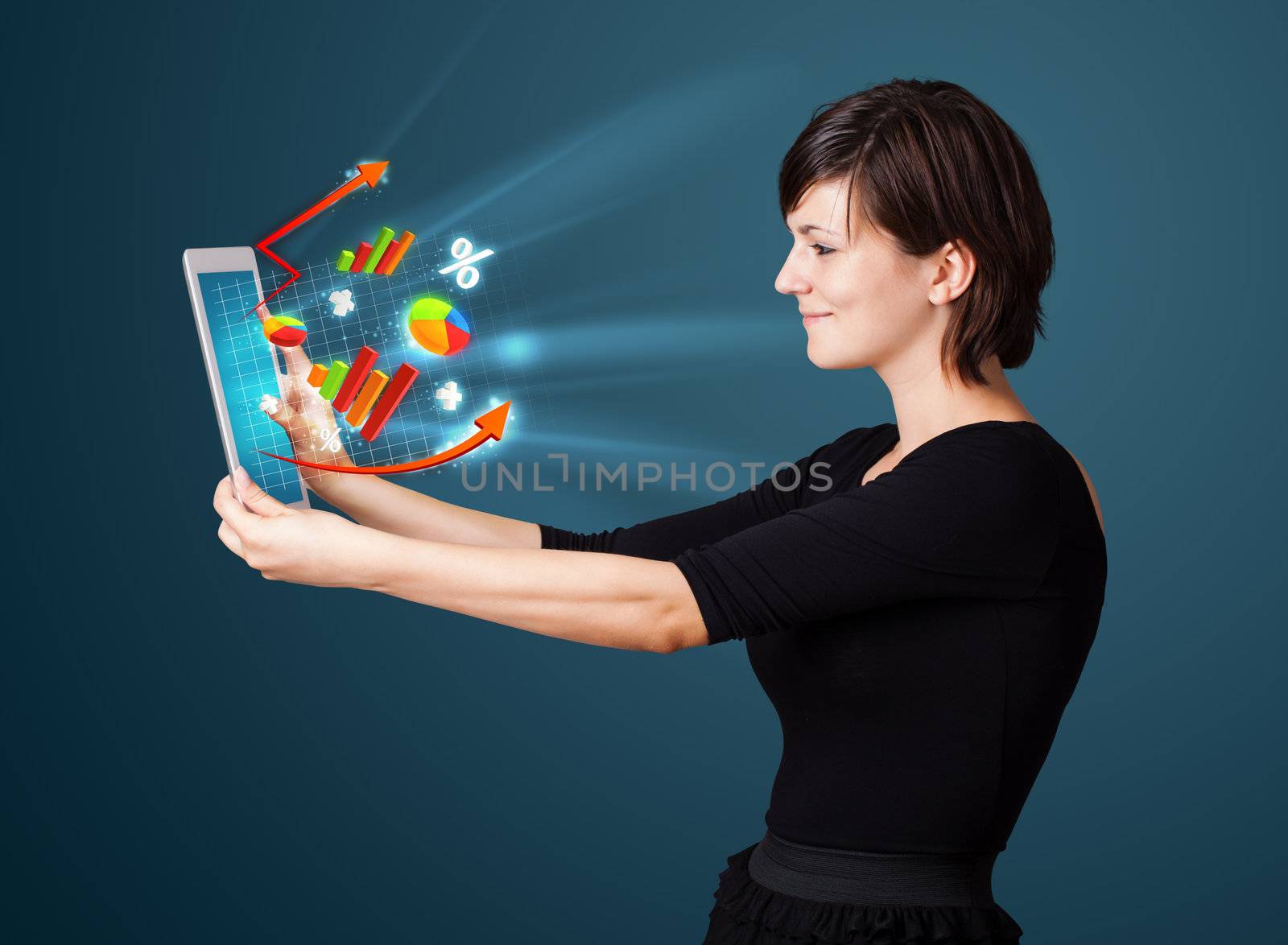 Young woman looking at modern tablet with abstract lights and va by ra2studio