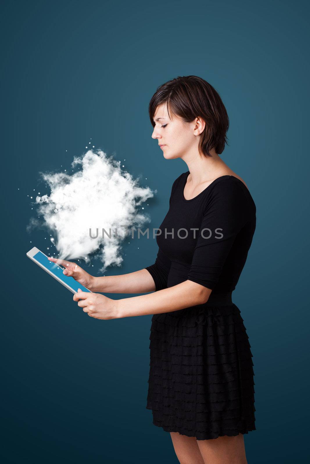 Young woman looking at modern tablet with abstract cloud by ra2studio