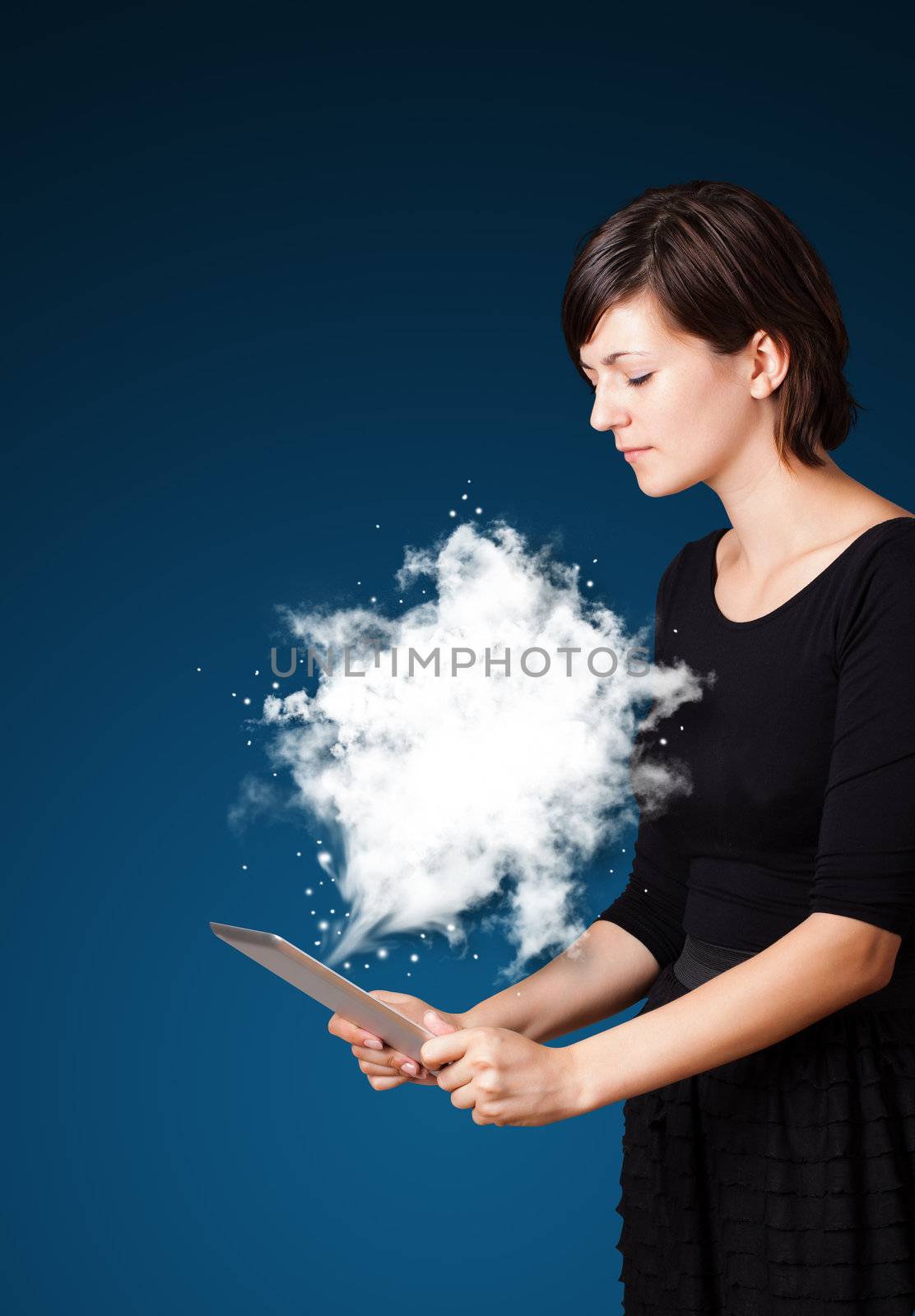 Young business woman looking at modern tablet with abstract cloud