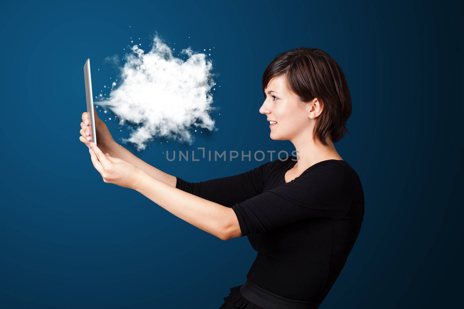 Young business woman looking at modern tablet with abstract cloud