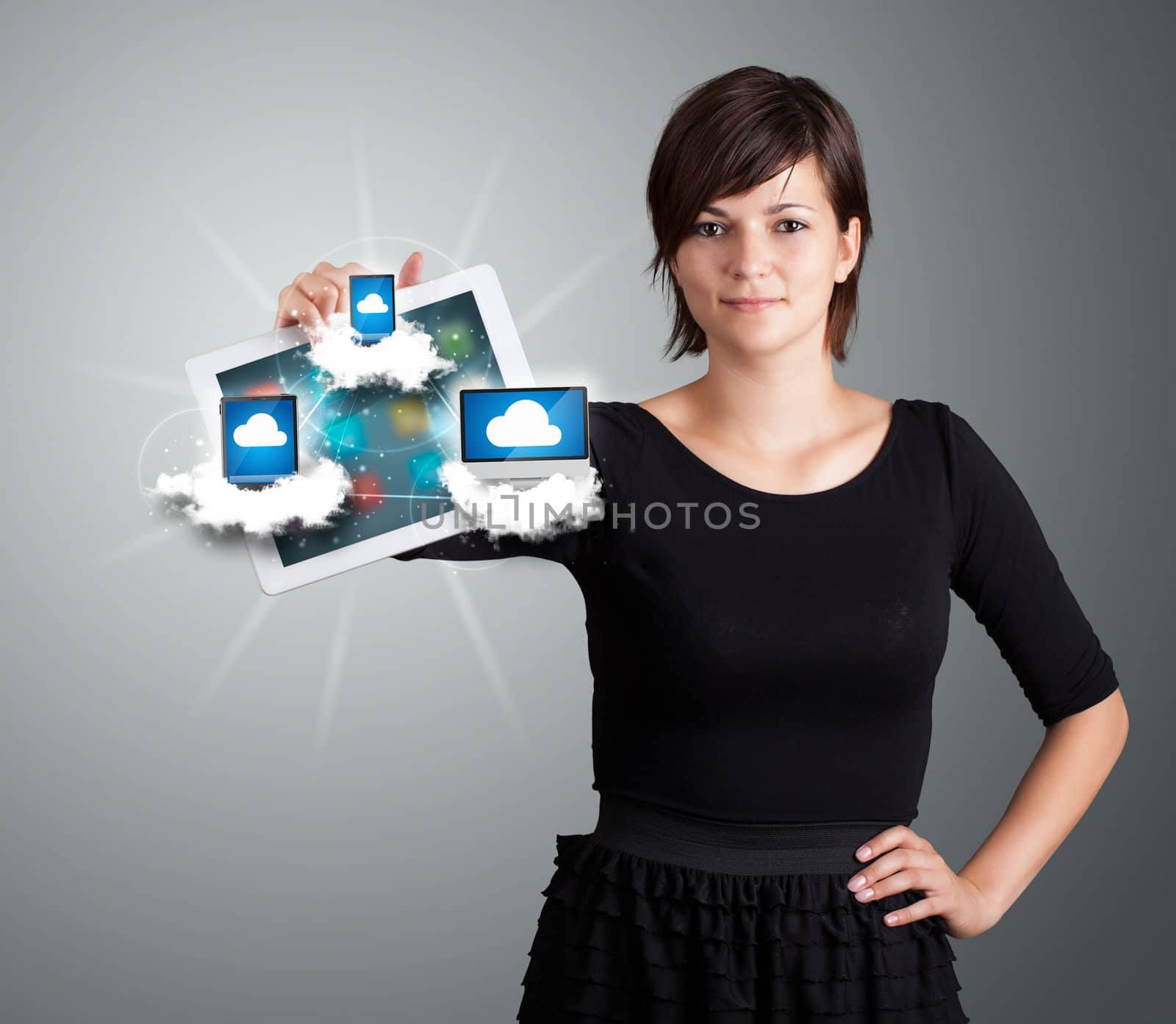 young woman holding tablet with modern devices in clouds by ra2studio