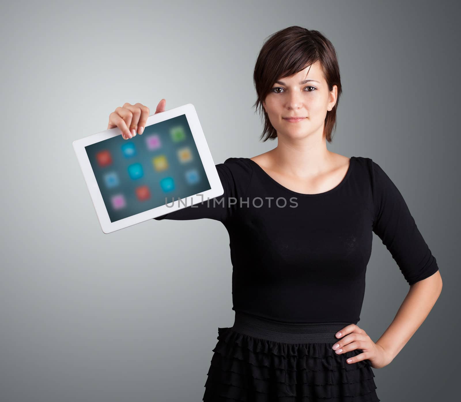 beautiful woman holding modern tablet with colorful icons