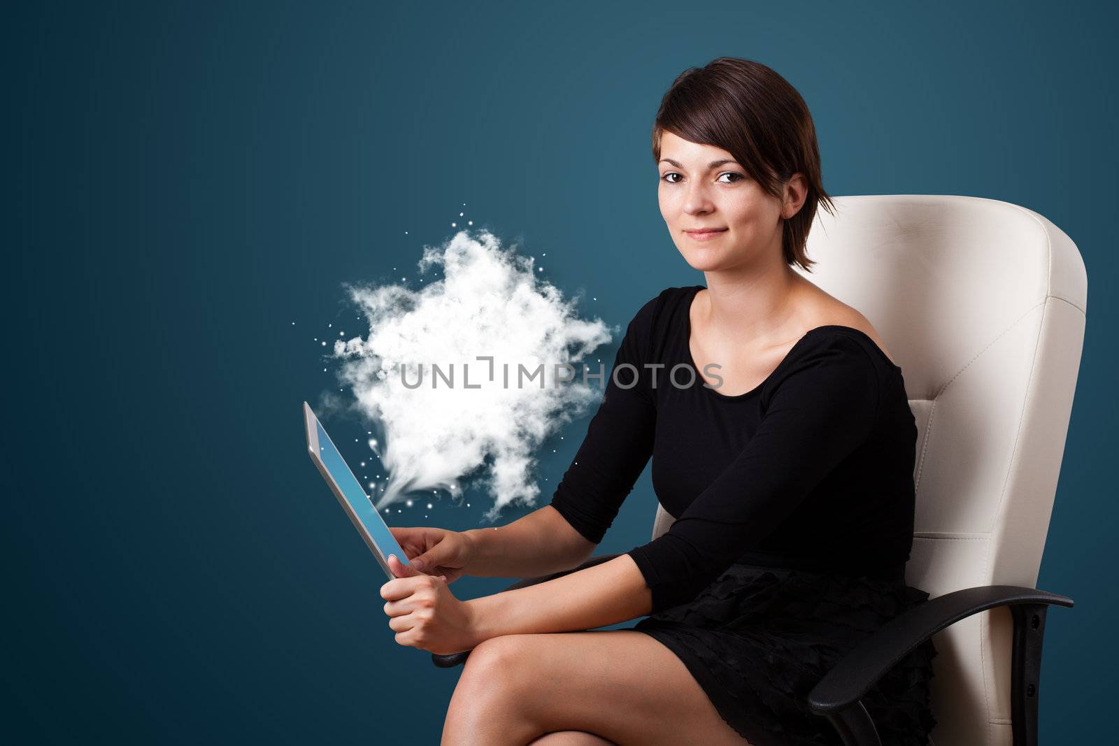 Young business woman looking at modern tablet with abstract cloud