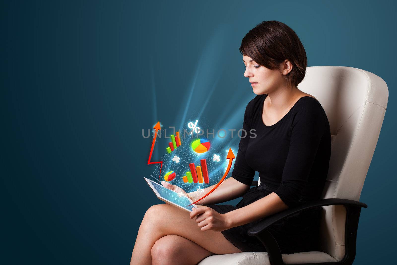 Young business woman looking at modern tablet with abstract lights and various diagrams