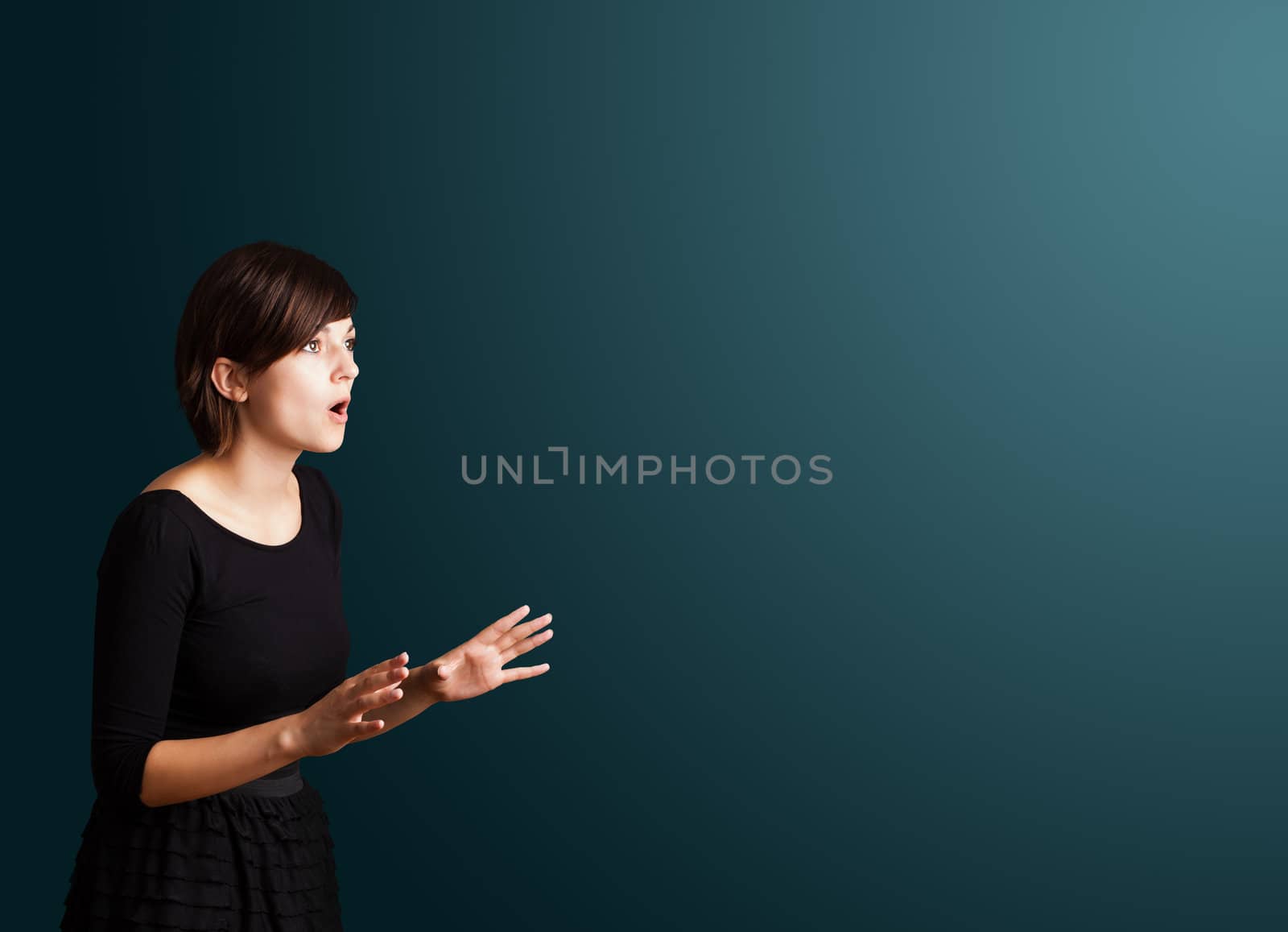 Beautiful young woman making gestures 