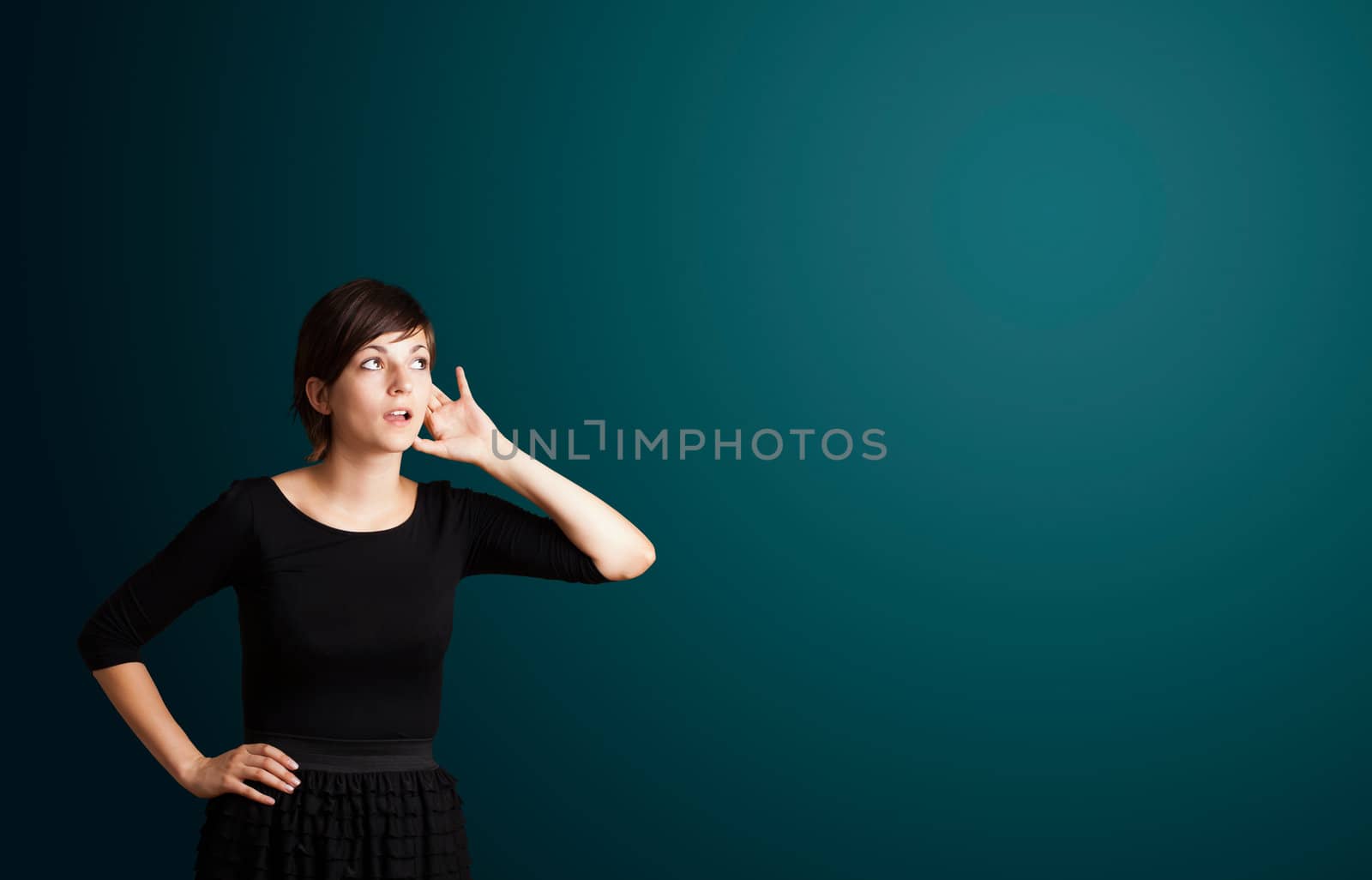 Beautiful young woman making gestures 