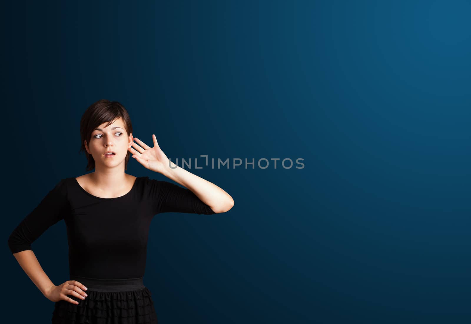 Beautiful young woman making gestures 