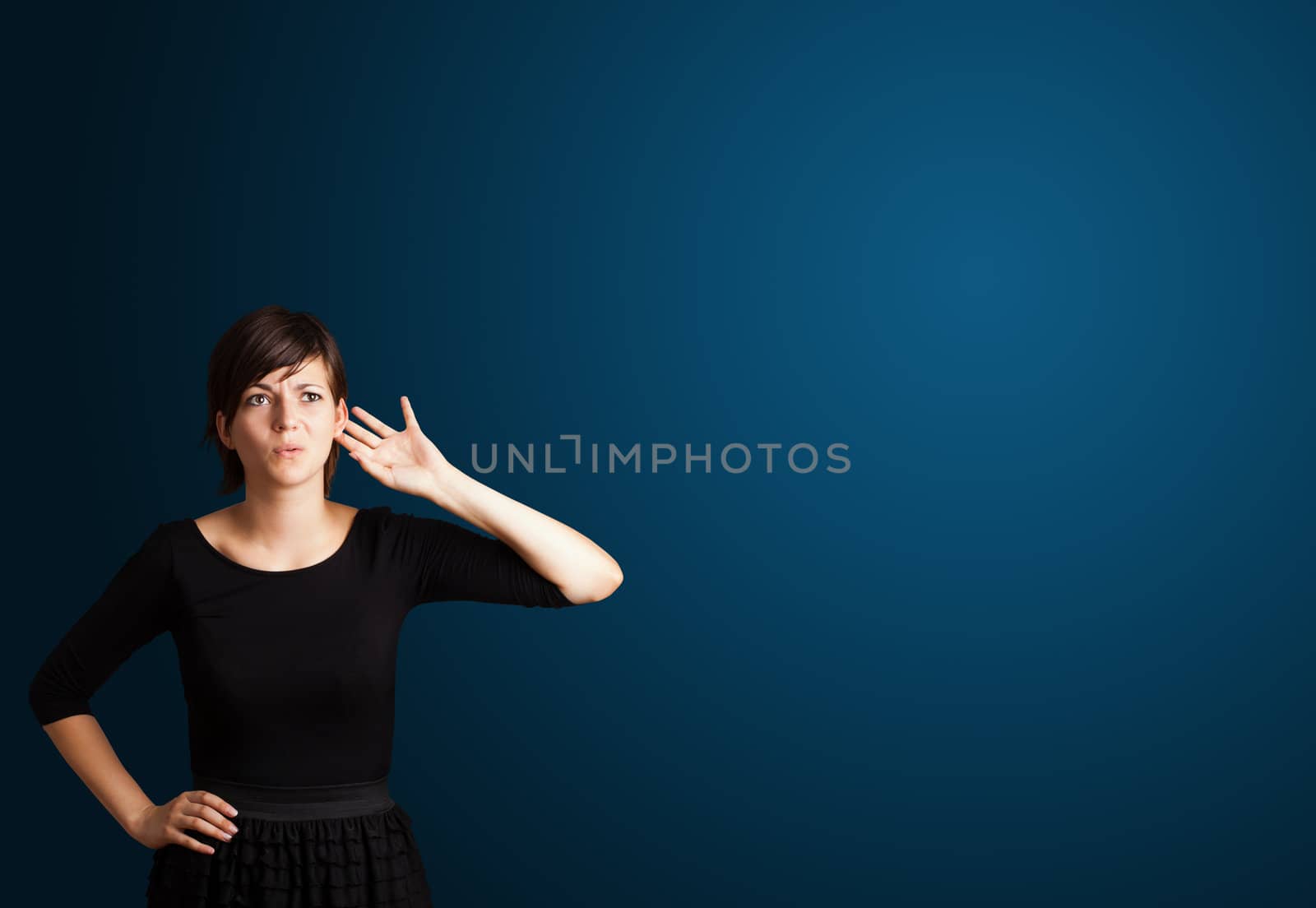 Beautiful young woman making gestures 