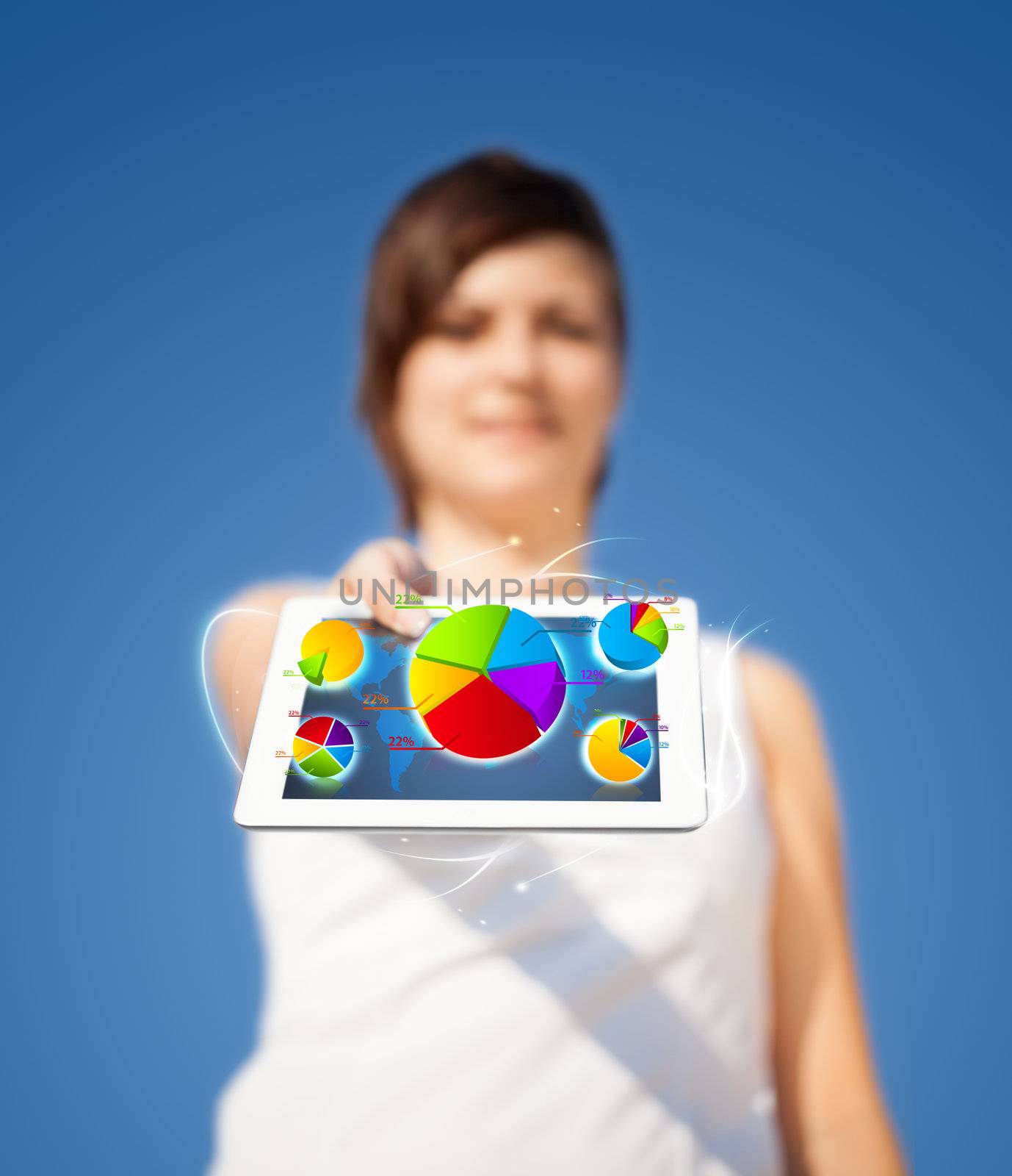 Young business woman looking at modern tablet with abstract light and various diagrams