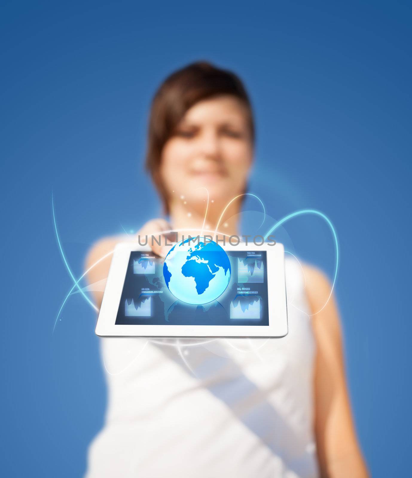 Young business woman looking at modern tablet with abstract lights and globe