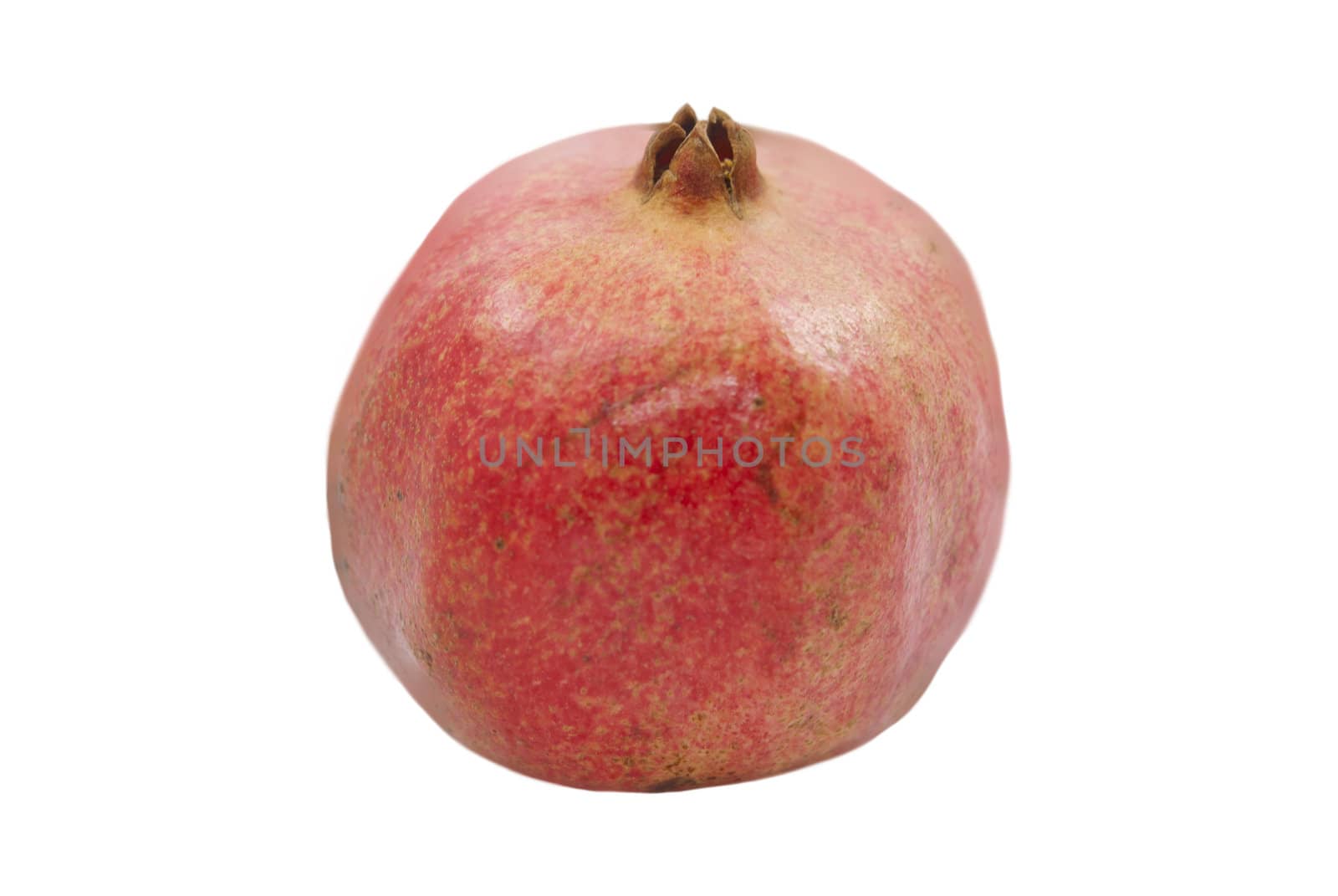 Closeup of red  pomegranate isolated on white background
