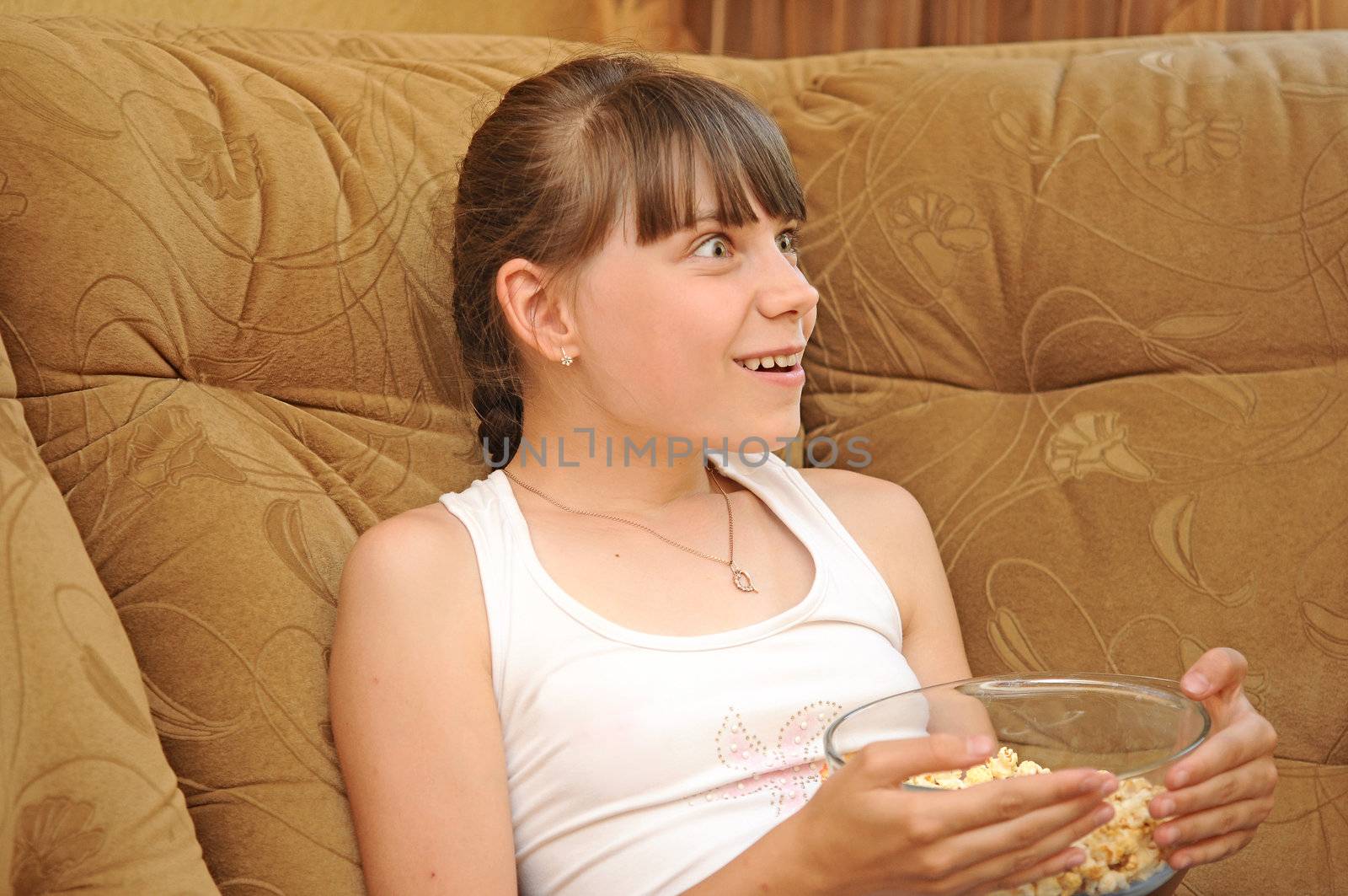 emotional girl with popcorn 