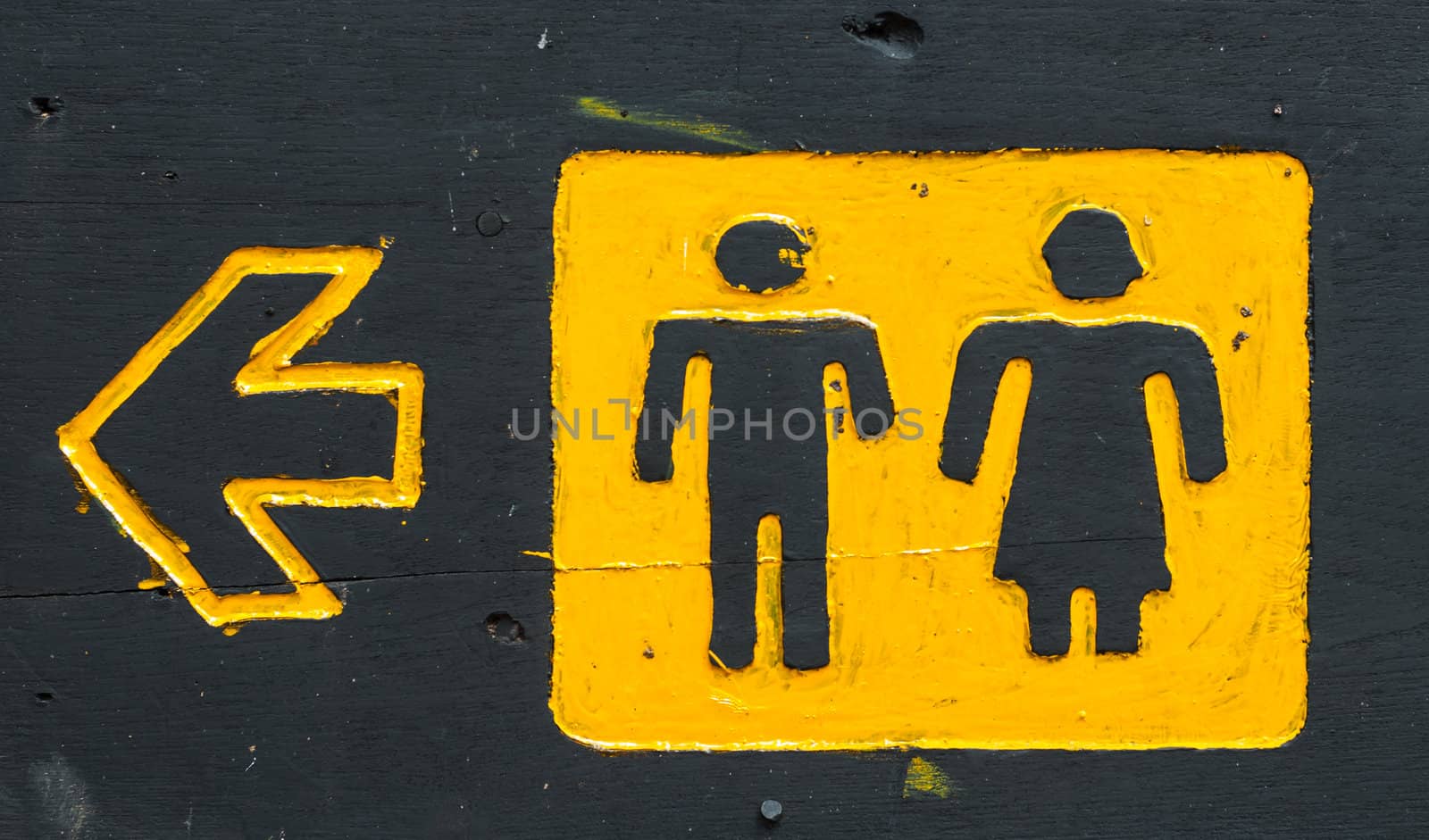 black board wooden male and female toilet sign and direction
