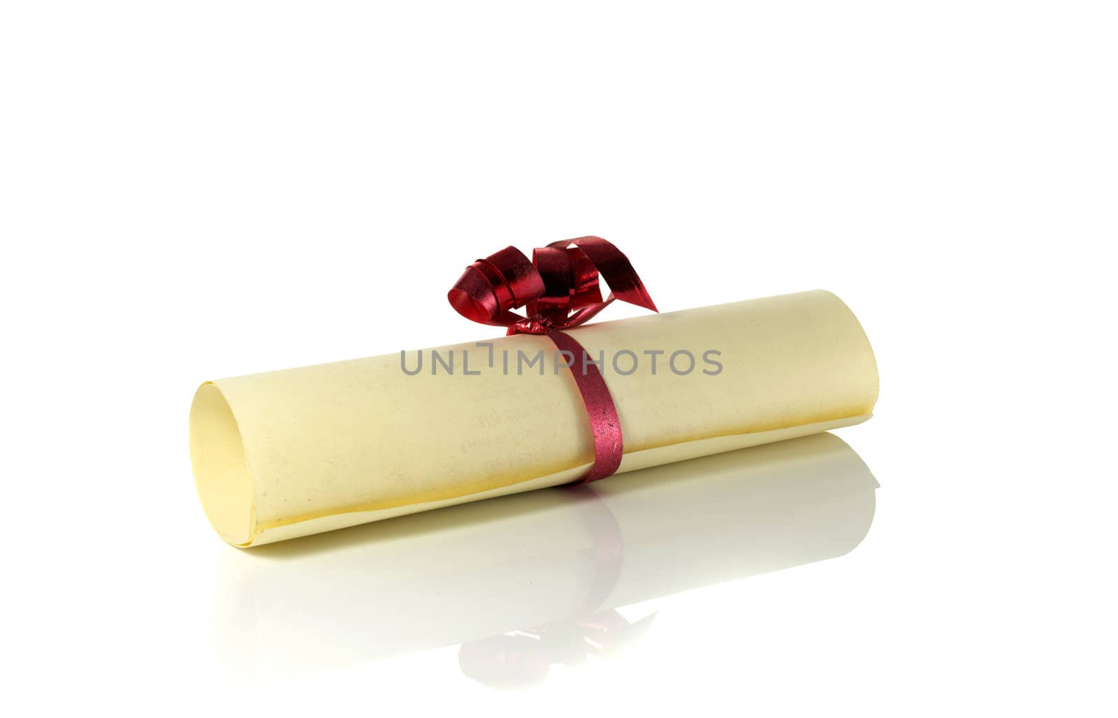paper wih red ribbon isolated on white