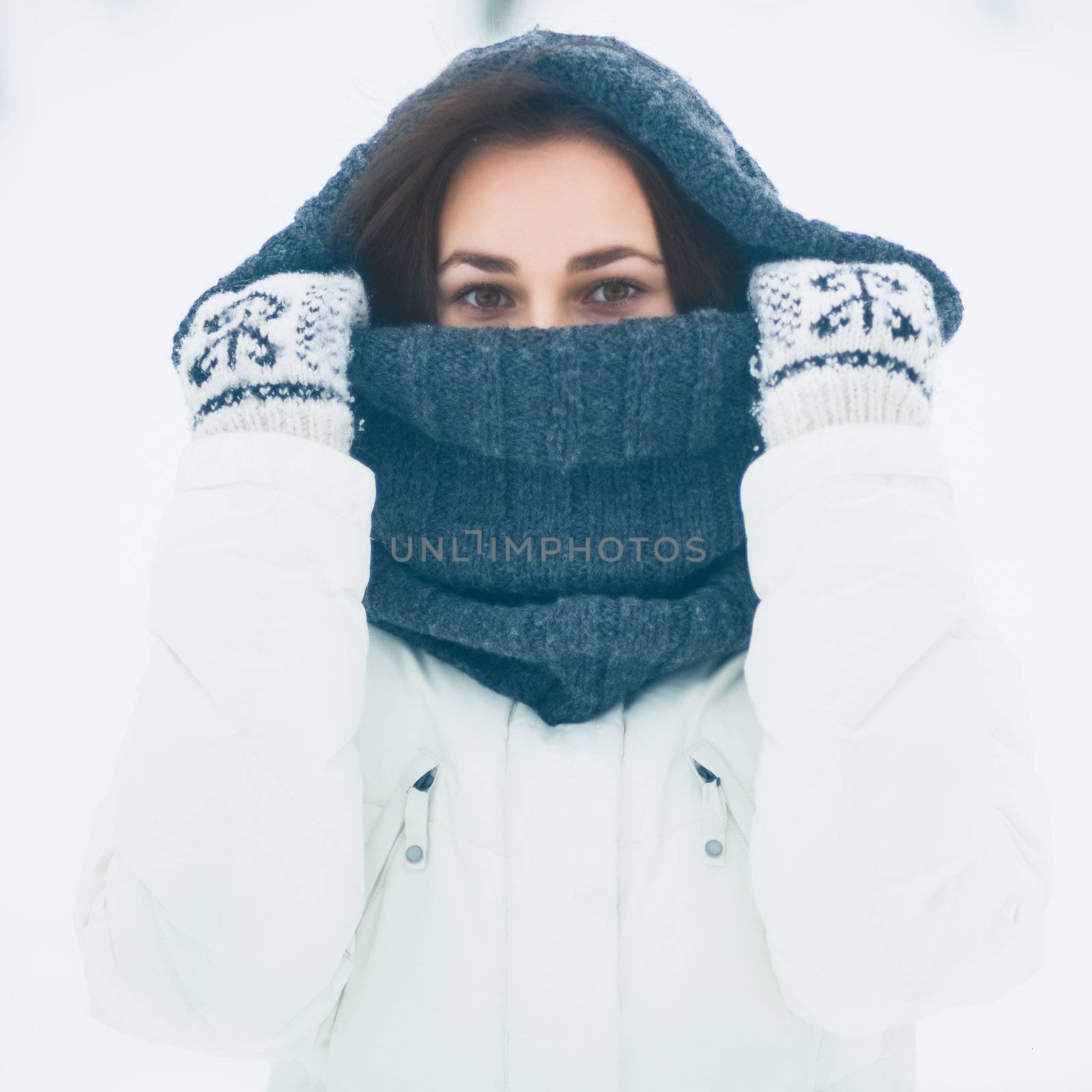 Portrait of beautiful young girl in winter day