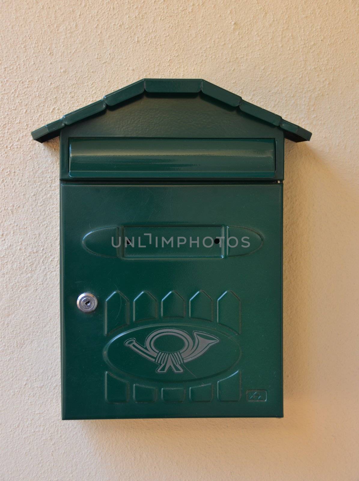 the one empty green closed street mailbox