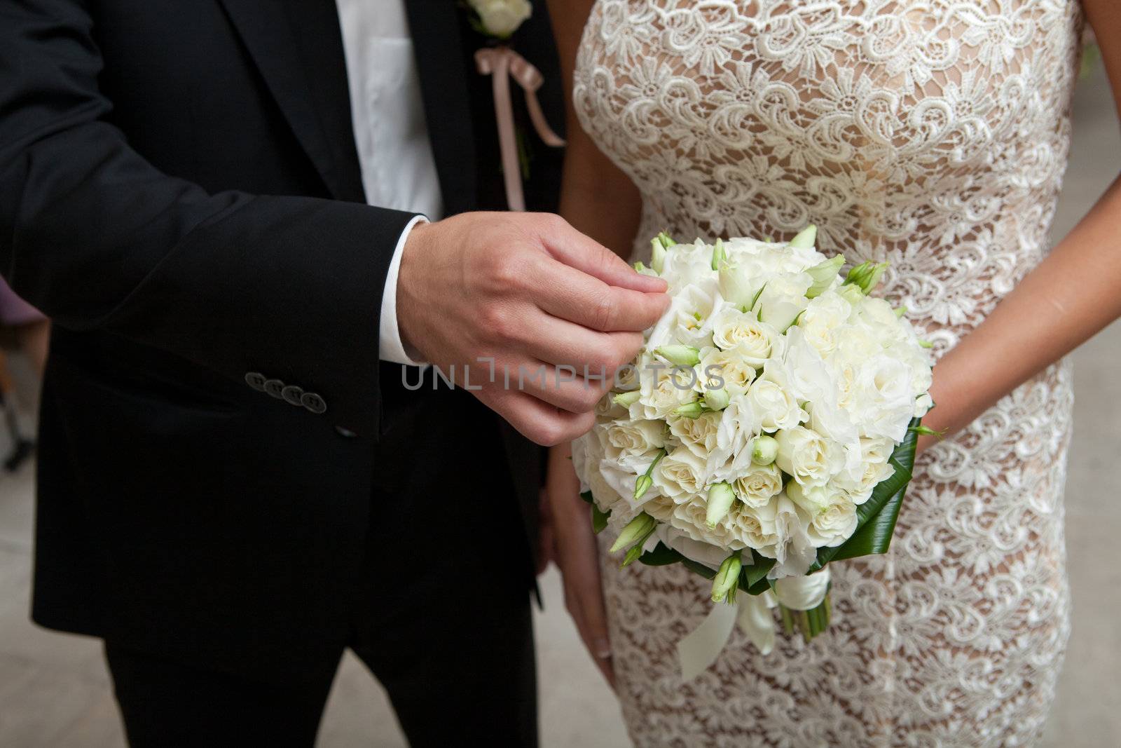 touching wedding bouquet