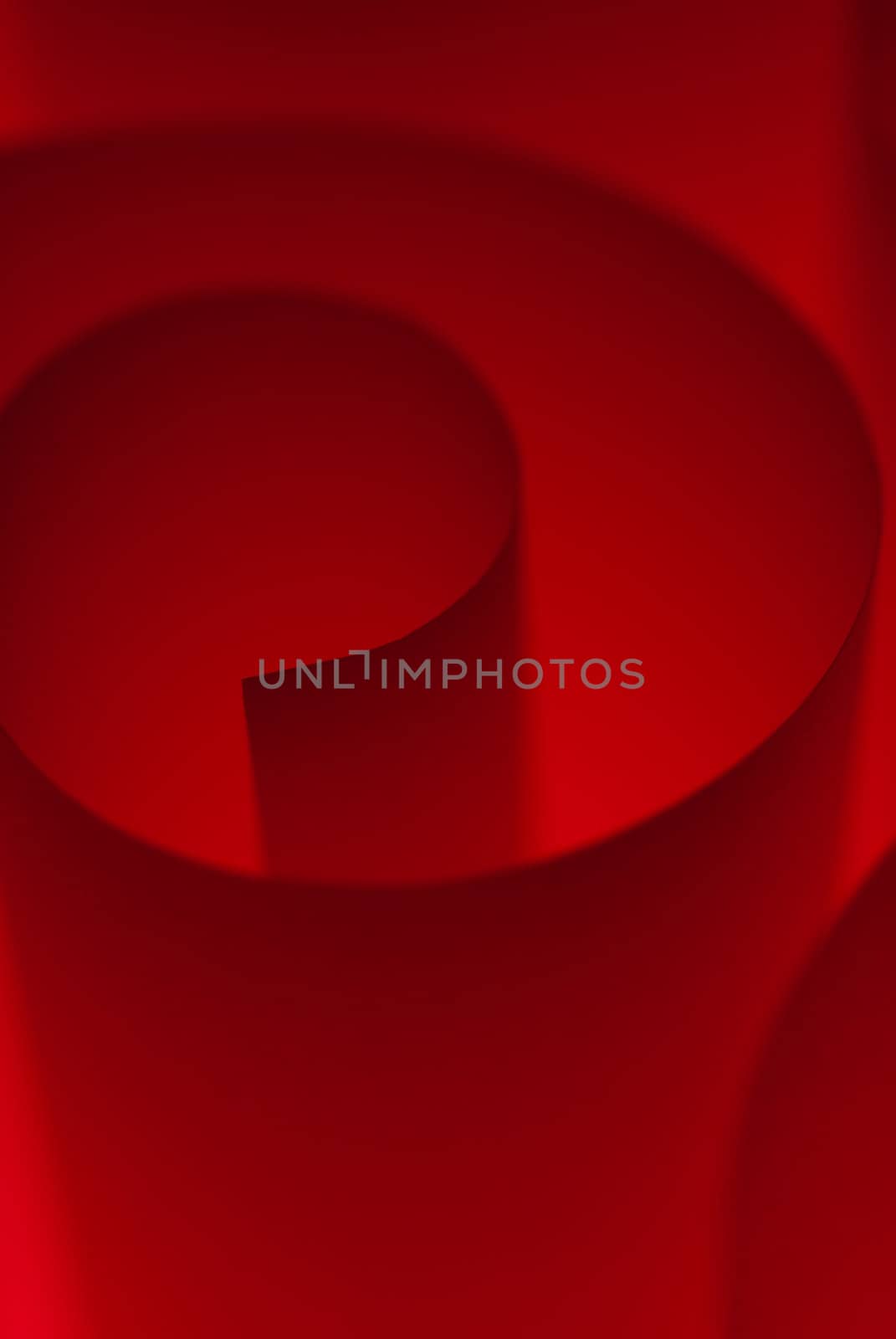 Spiraled origami paper under red lighting macro