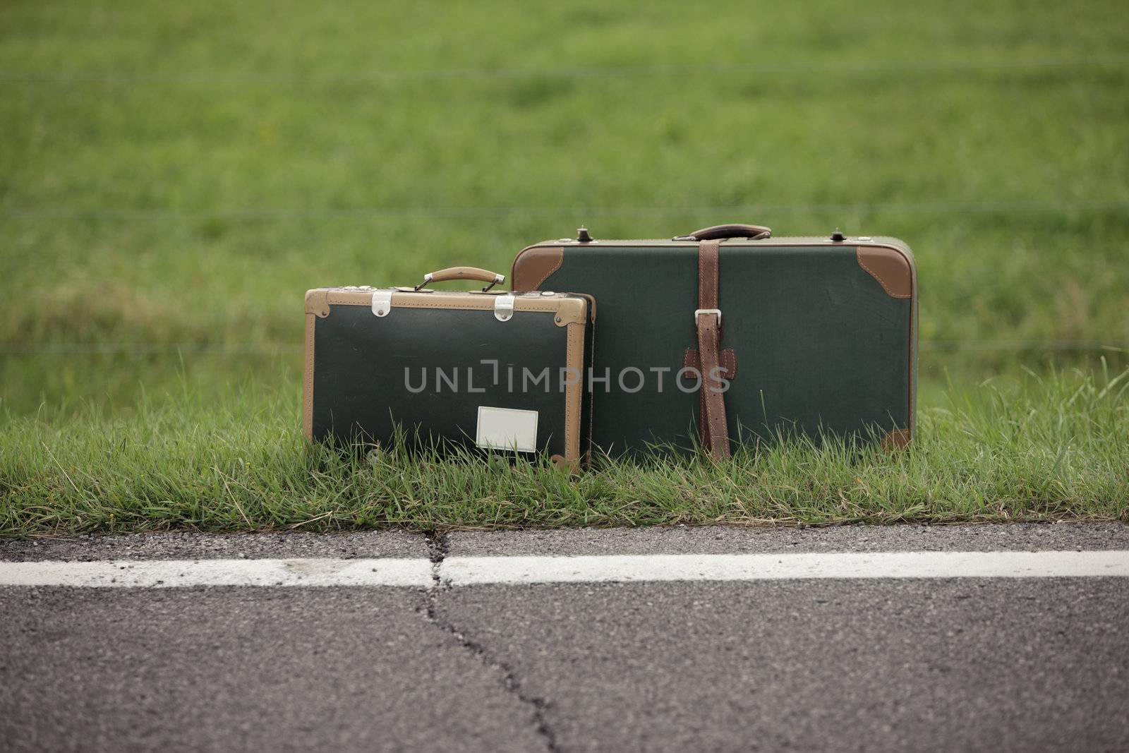 A Old Suitcase  beside the Road.