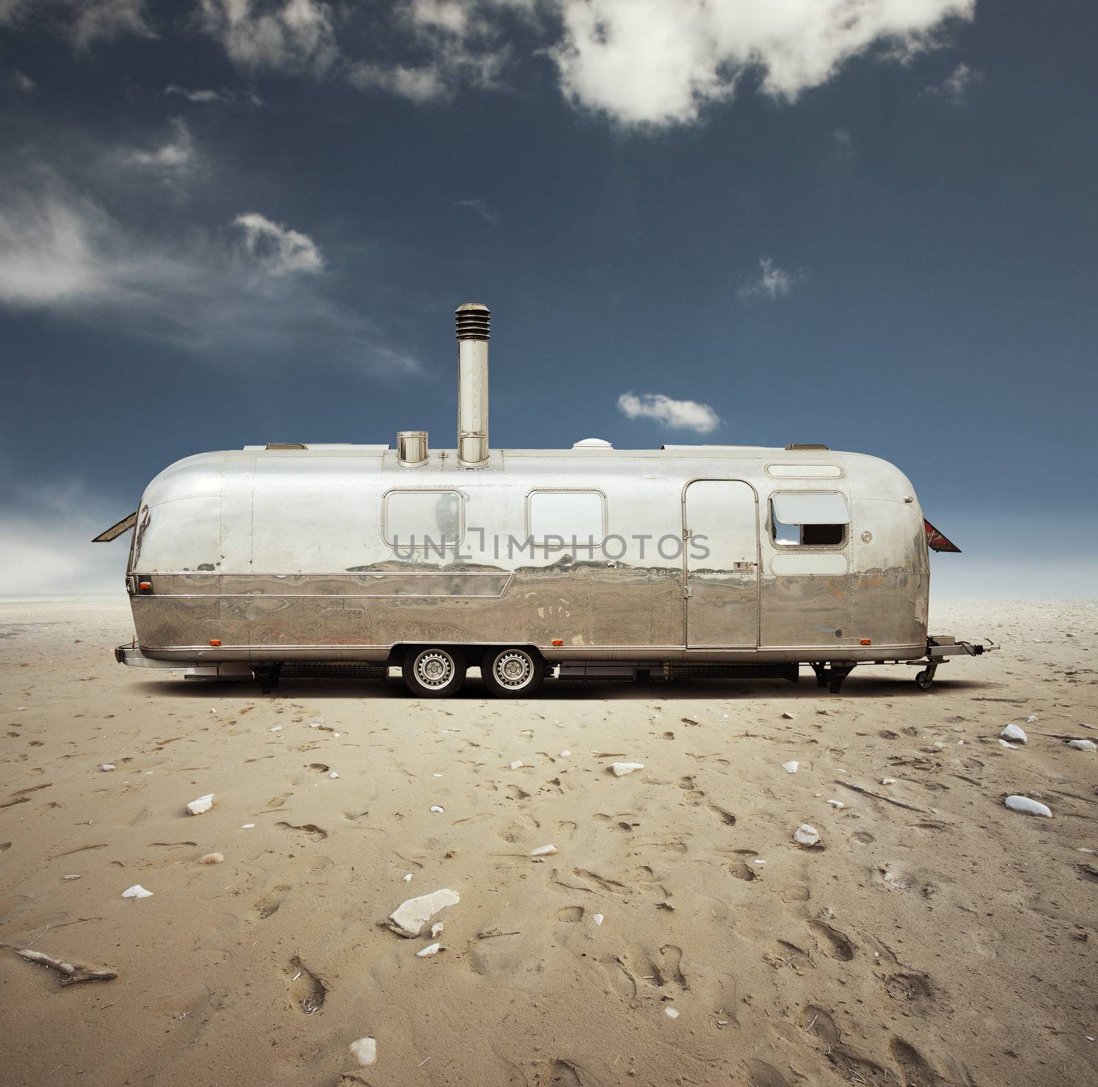 steel caravan in the desert by stokkete