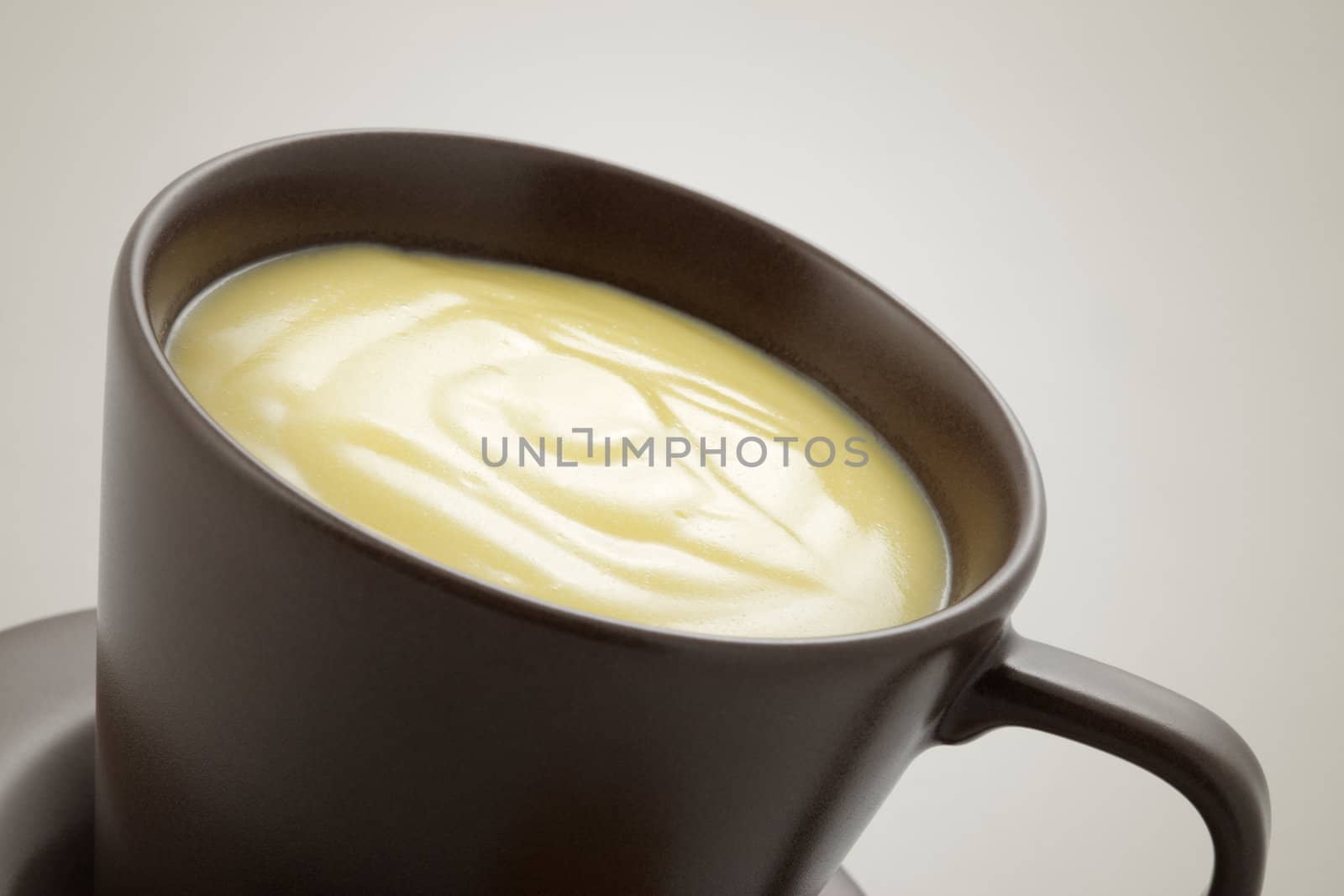 Cup of white chocolate, close up