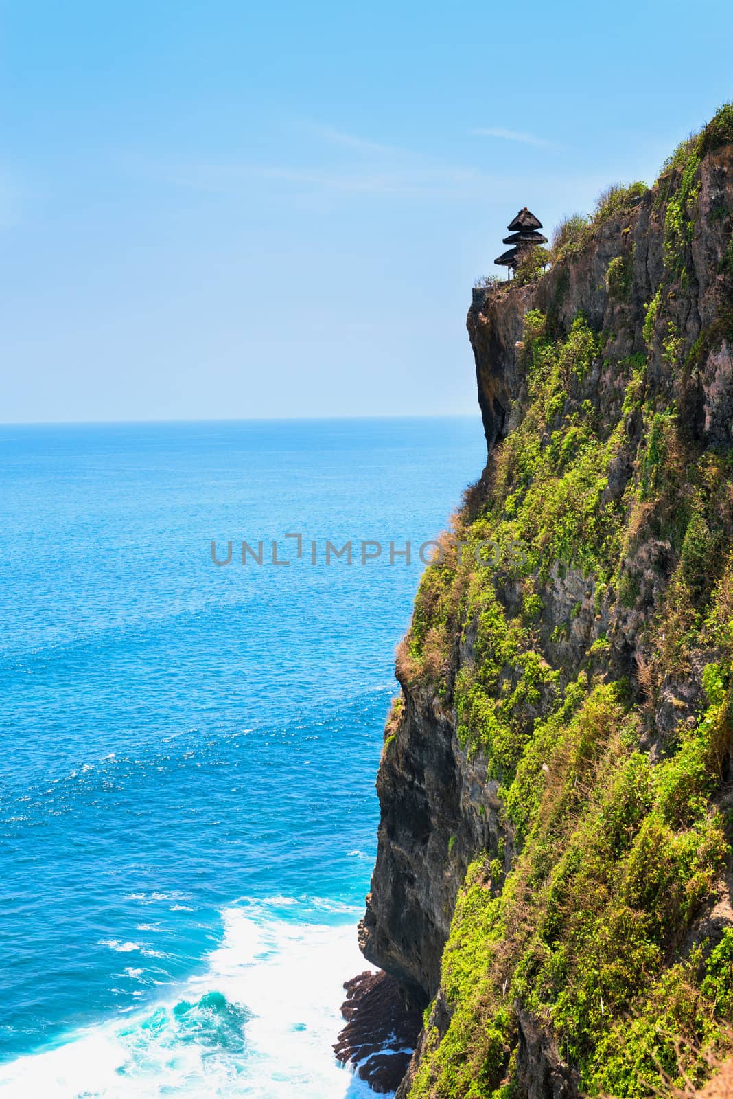 Pura Luhur Uluwatu, Bali, Indonesia - temple complex on the rock above the sea. Built in the 11th century, it is one of nine directional temples to protect Bali from evil spirits.