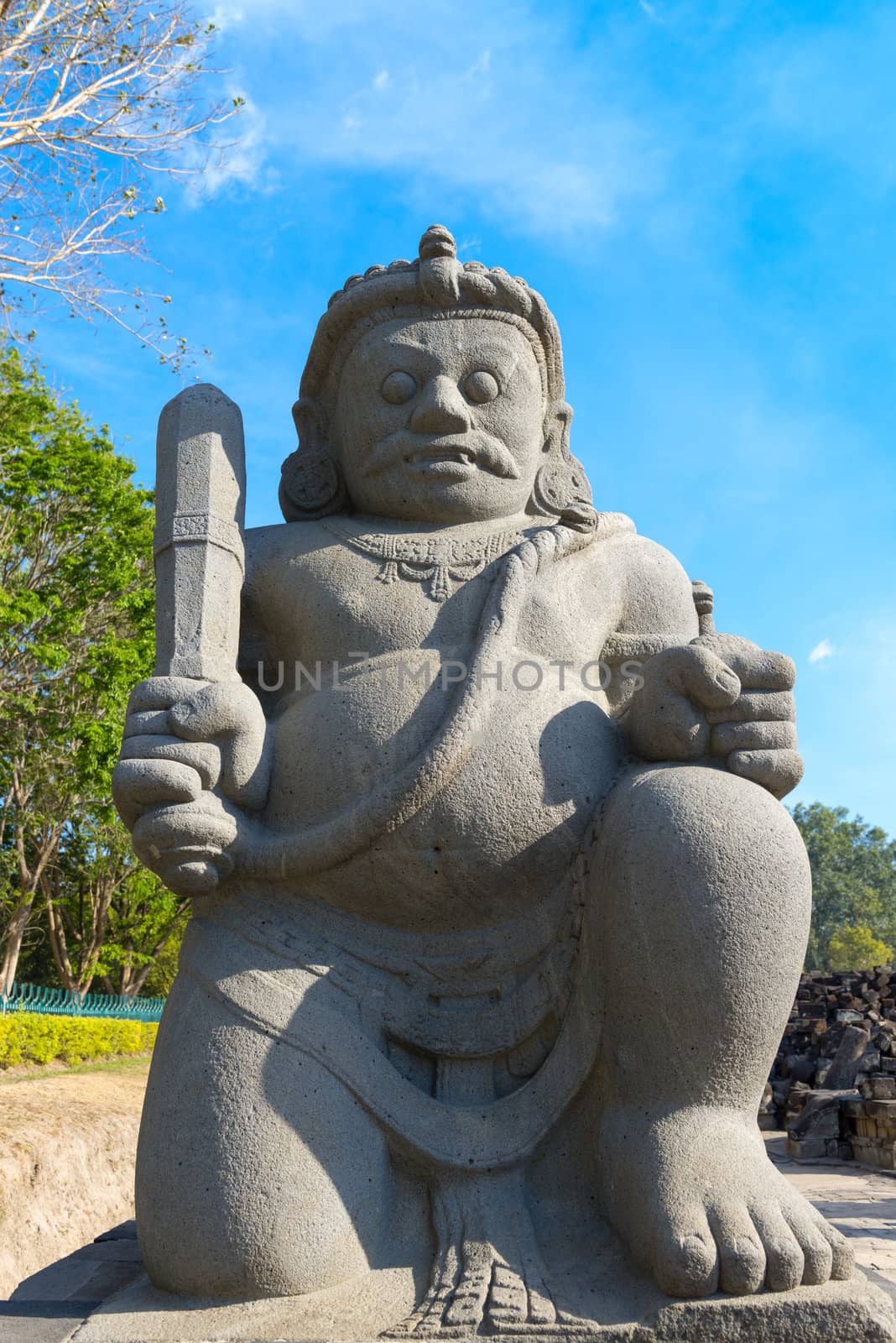 Guardian of Candi Sewu Buddhist complex in Java, Indonesia by iryna_rasko