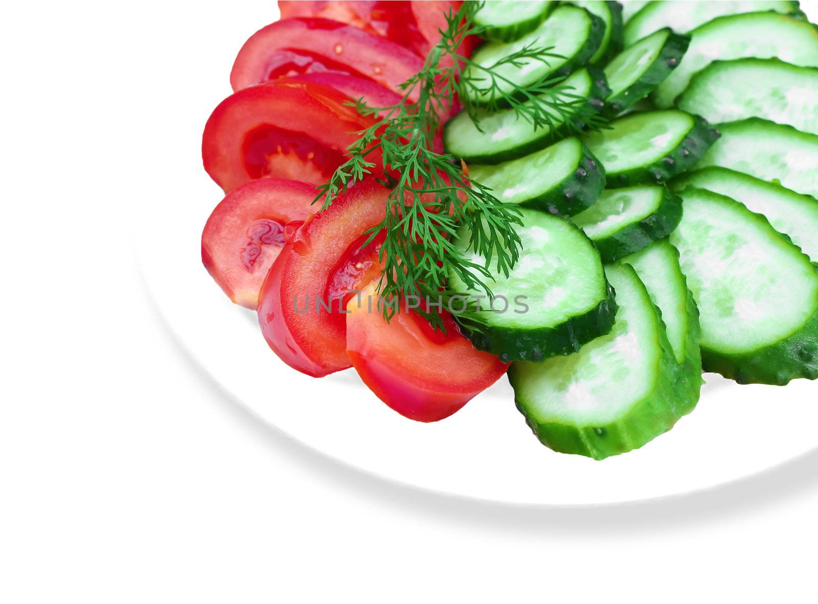 Tomato and cucumber with dill on a plate by NickNick