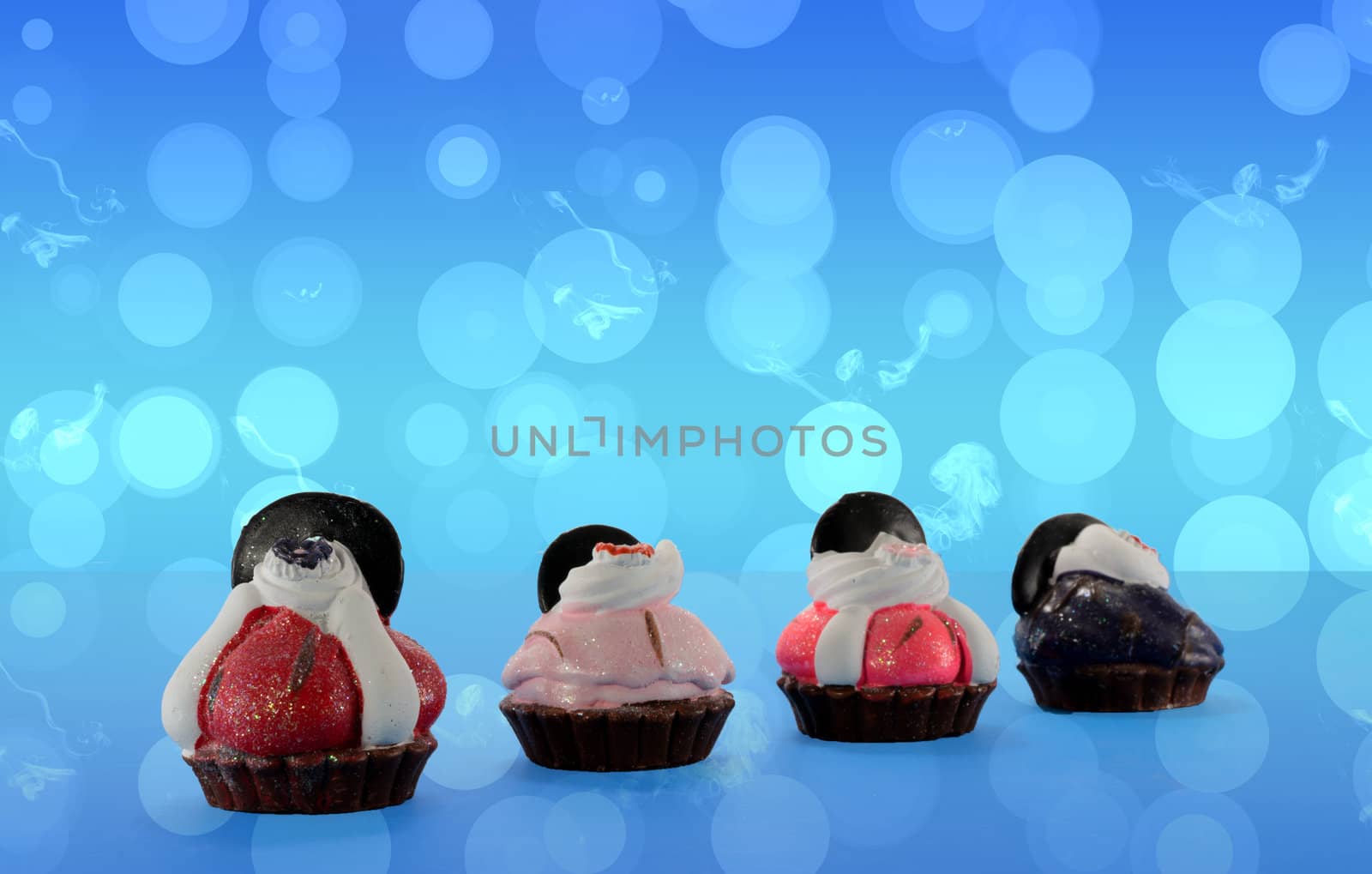 imitation cupcakes with blue background by compuinfoto