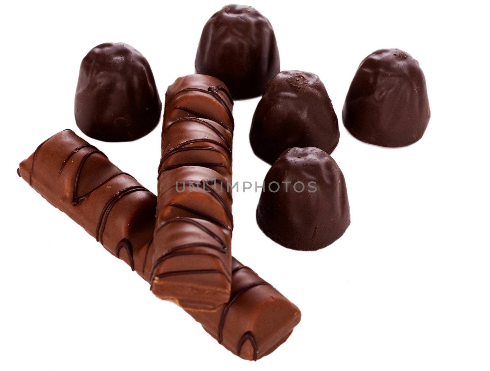 Chocolate candies isolated on white background.
