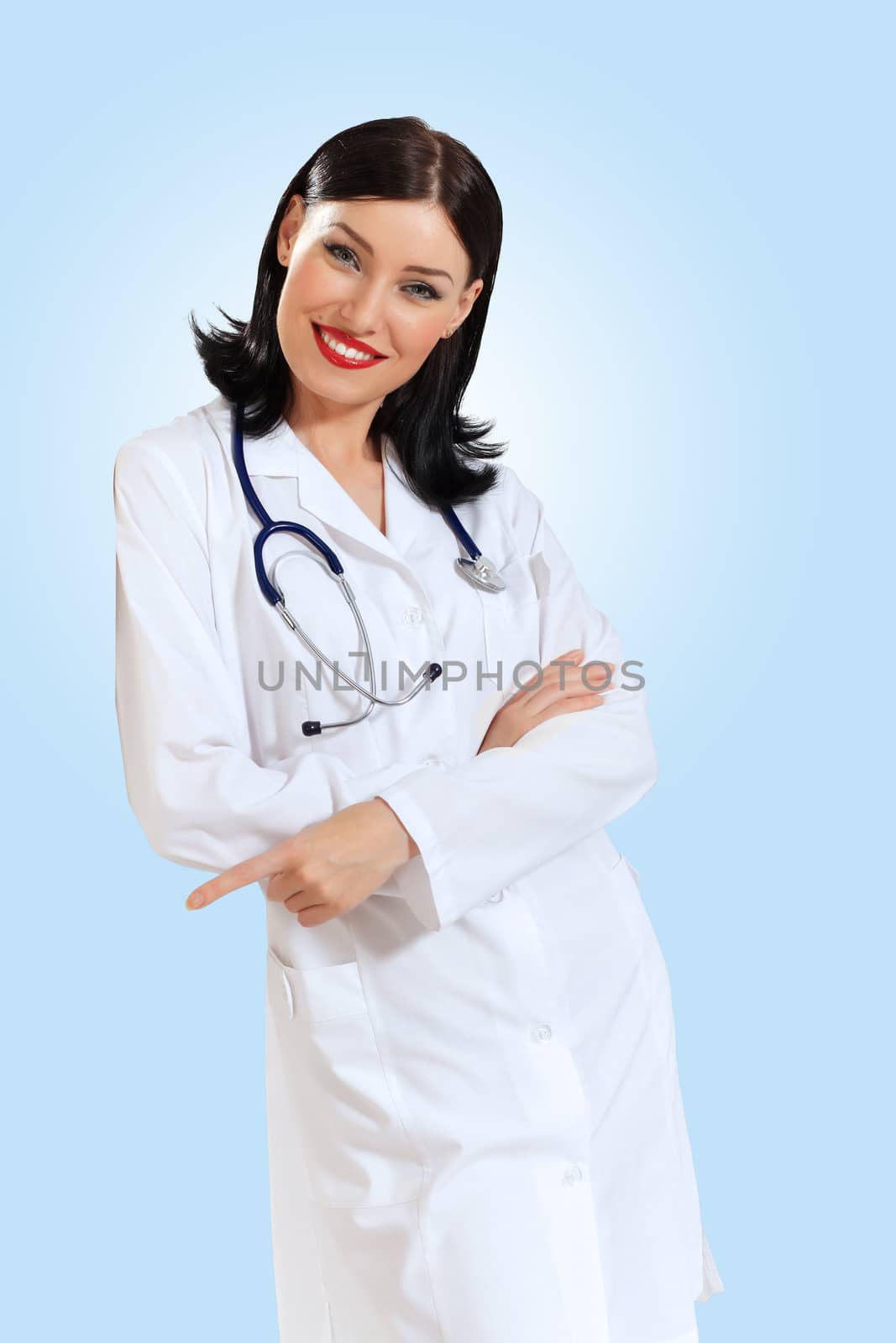 Portrait of happy successful young female doctor holding a stethoscope