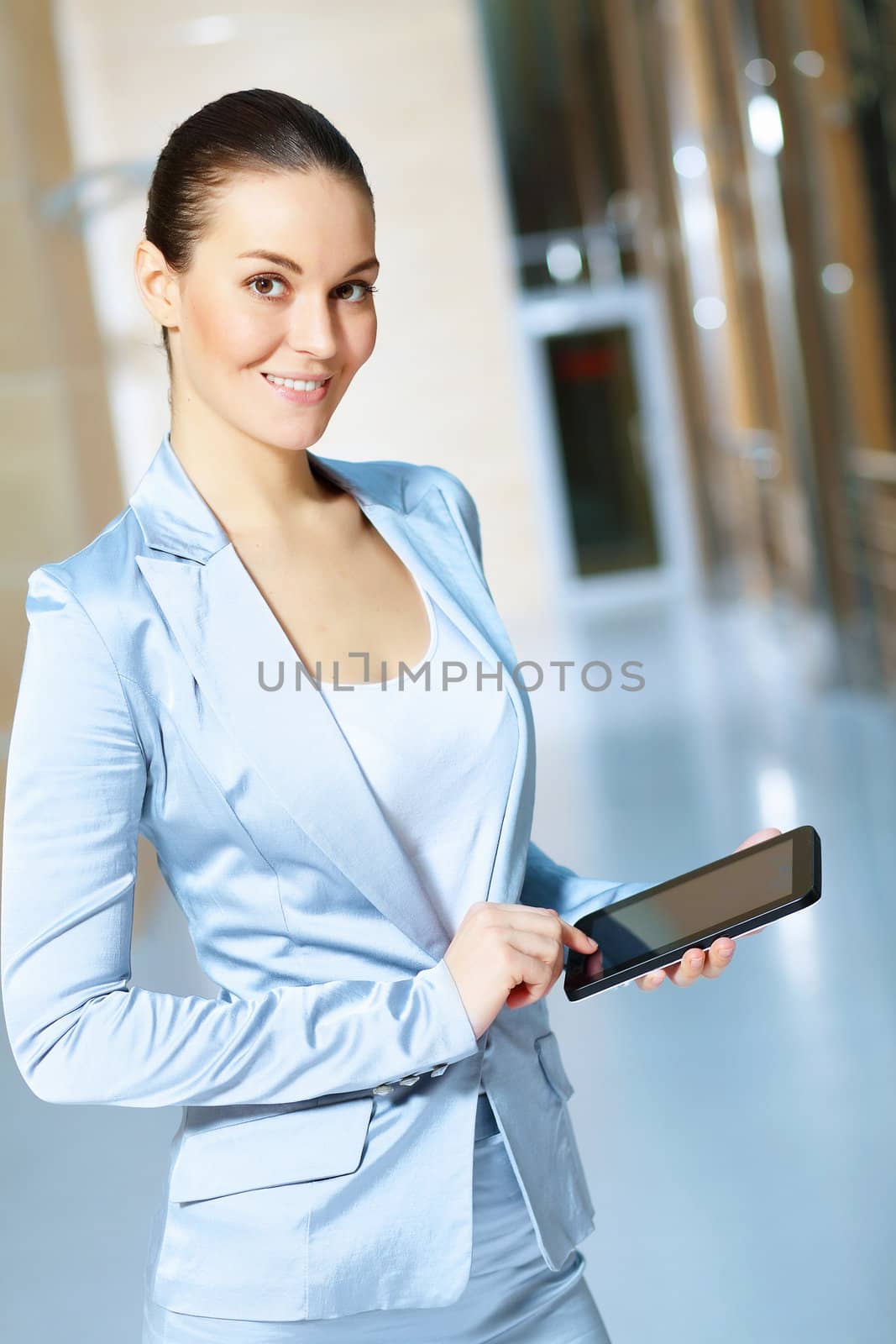 portrait of a confident young businesswoman by sergey_nivens