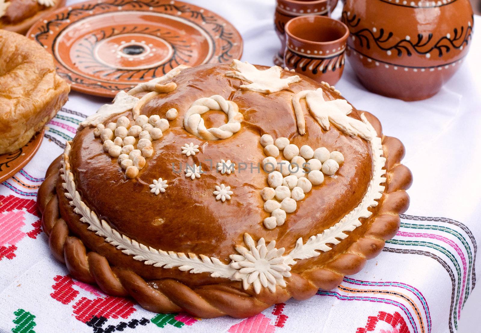 Traditional Moldovan loaf. Bread for the embroidered tablecloth
