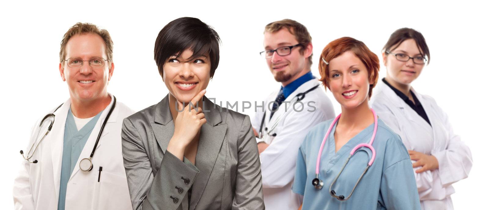 Young Mixed Race Woman with Doctors and Nurses Behind Isolated on a White Background.