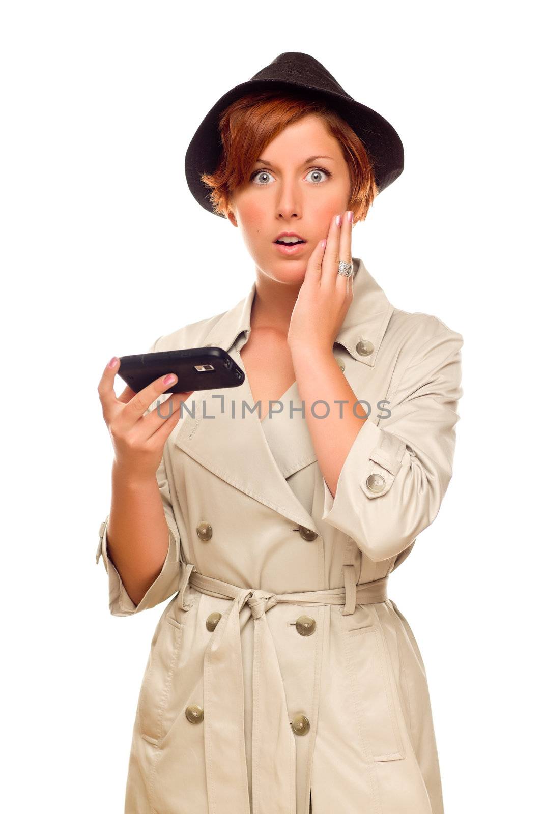 Shocked Young Woman Holding Smart Cell Phone Isolated on a White Background.