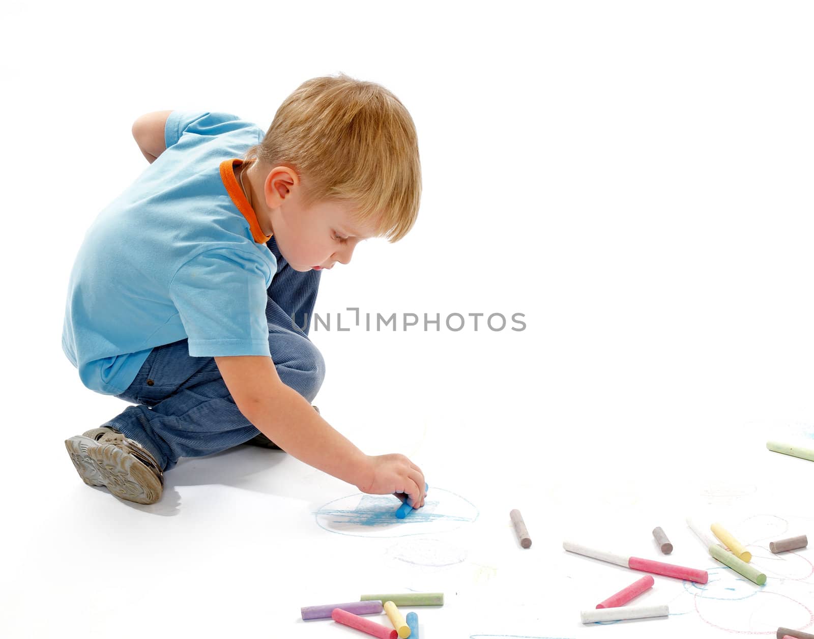 Boy Drawing with Chalk  by zhekos
