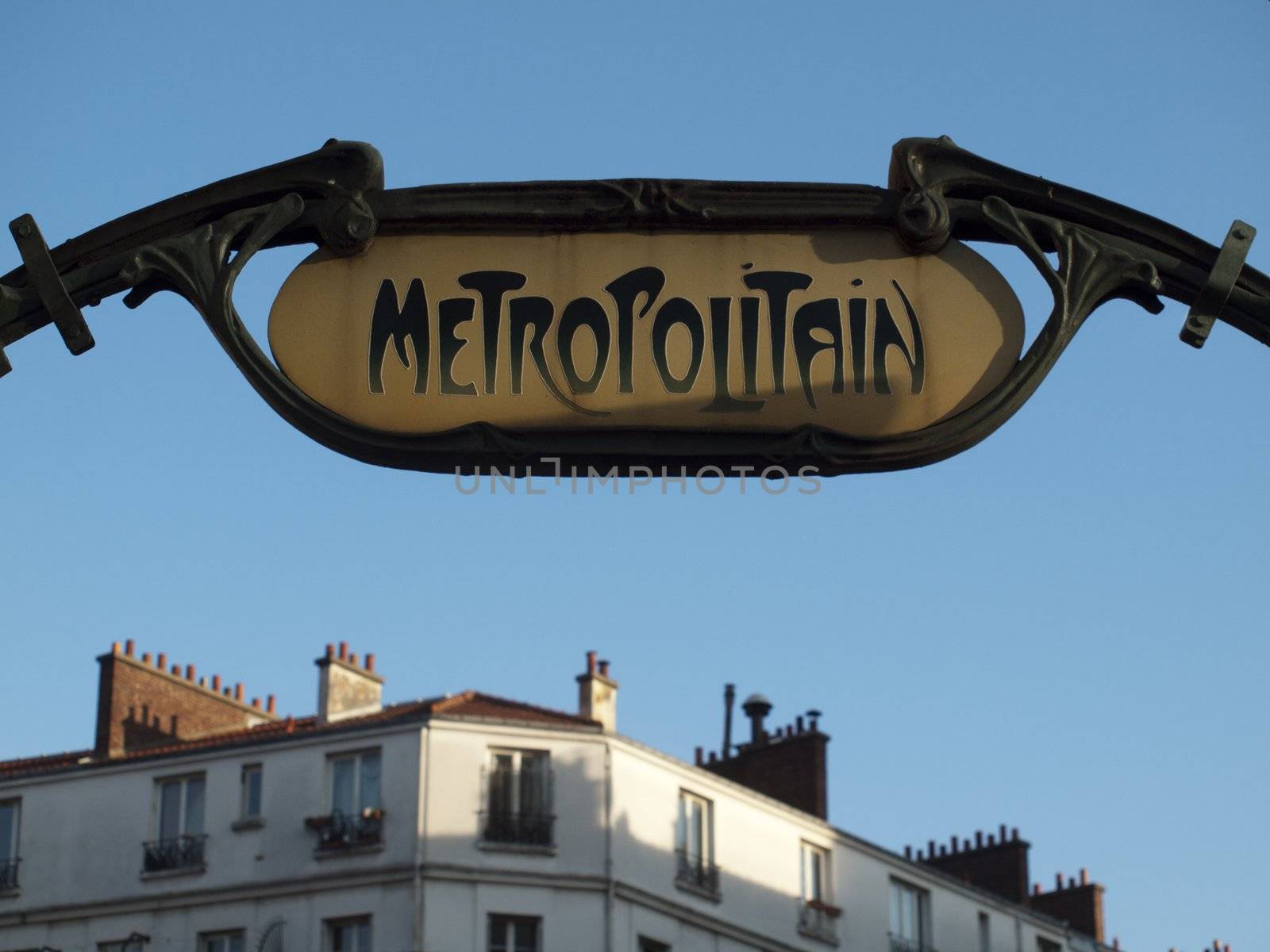 Metropolitain sign at the entrance of the subway in Paris