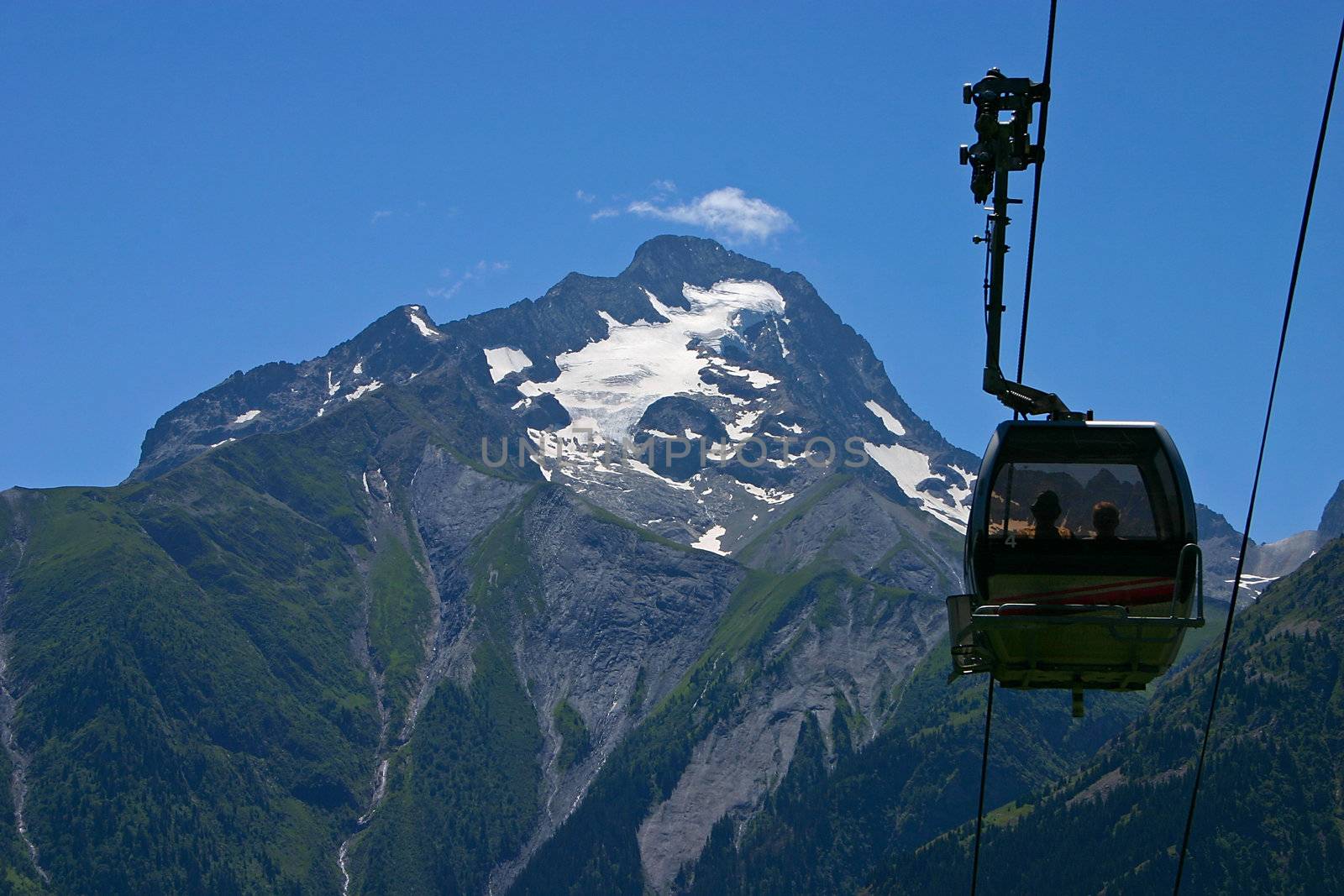 Ski gondola in front of a mountain