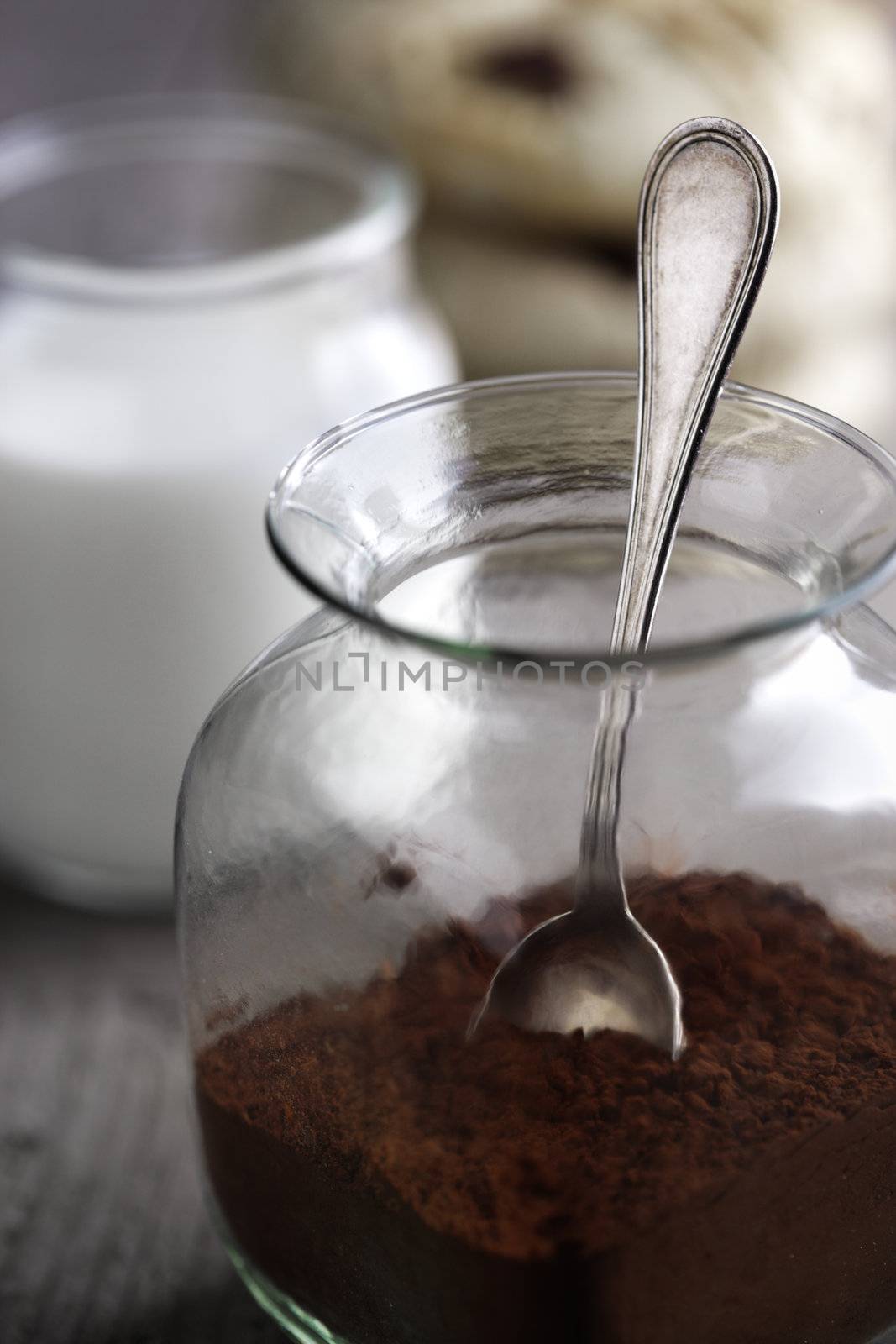 jar with cocoa powder and teaspoon