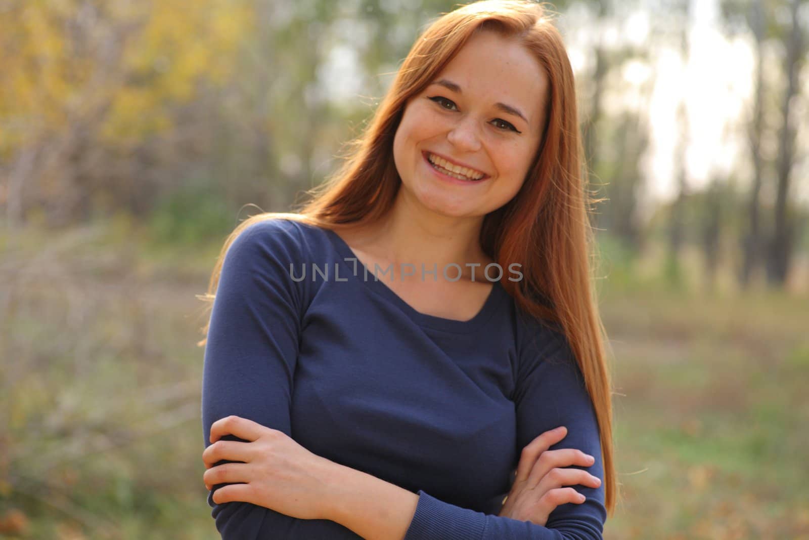 portrait of cute red haired young woman, outdoor